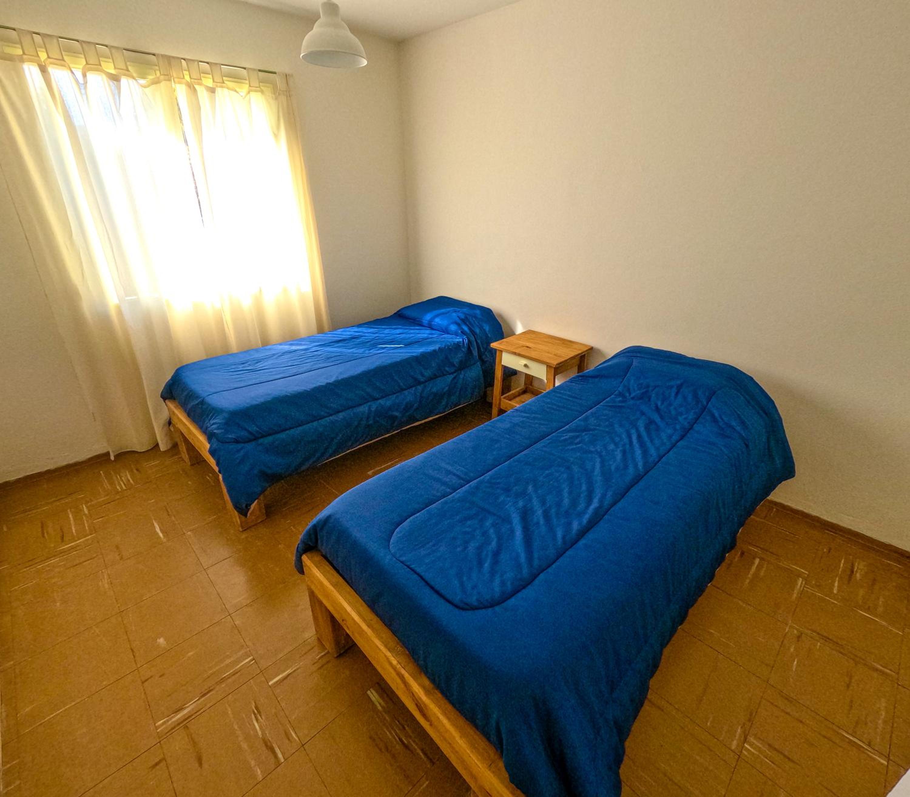 Single Bed in Dormitory Room