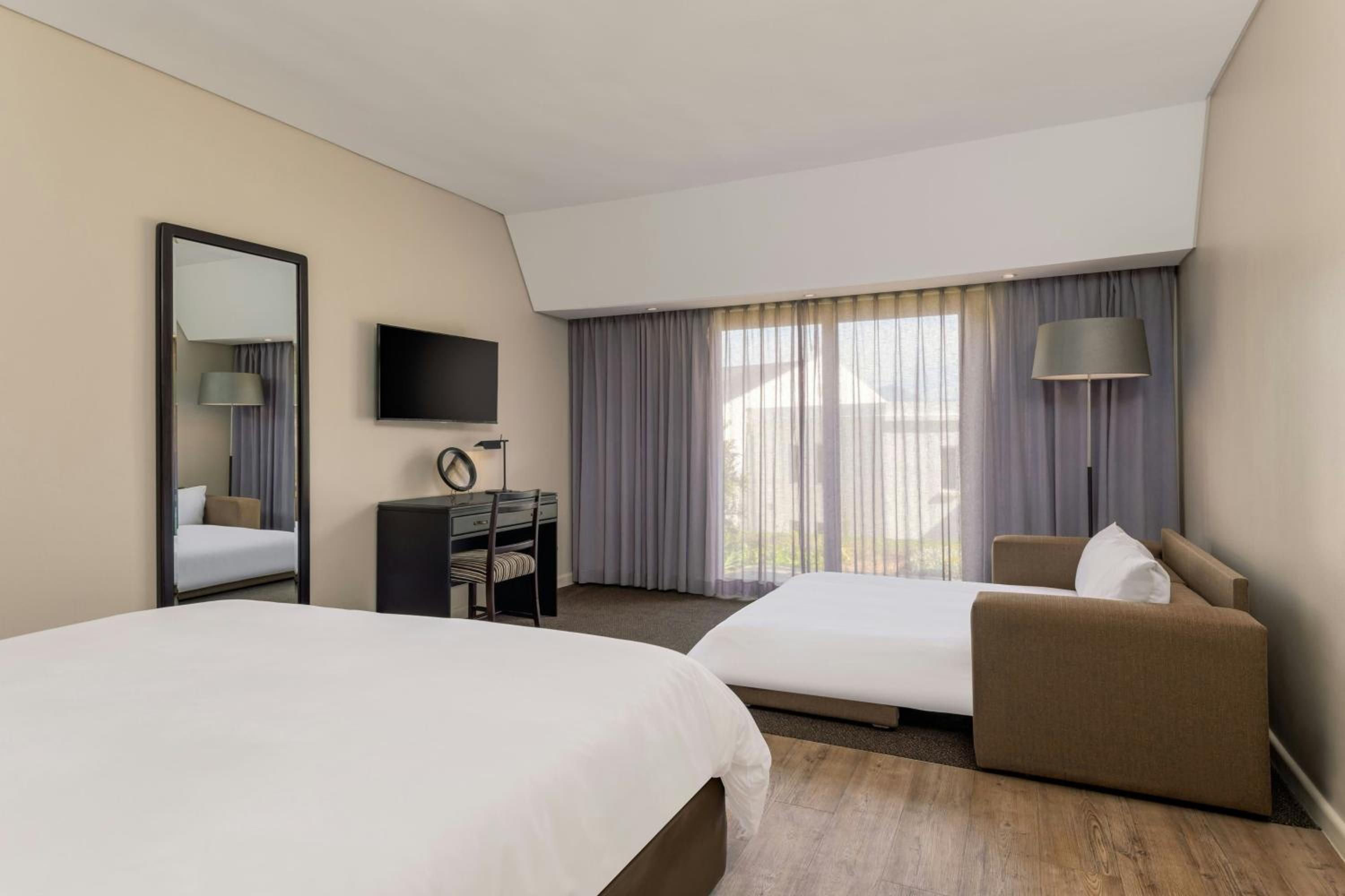 King Room with Sofa Bed and Garden View - Photo 1