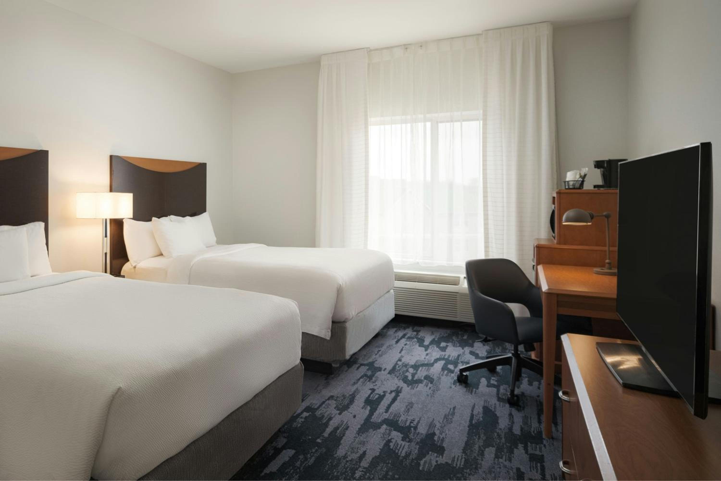 Queen Room with Two Queen Beds - Hearing Accessible - Photo 1