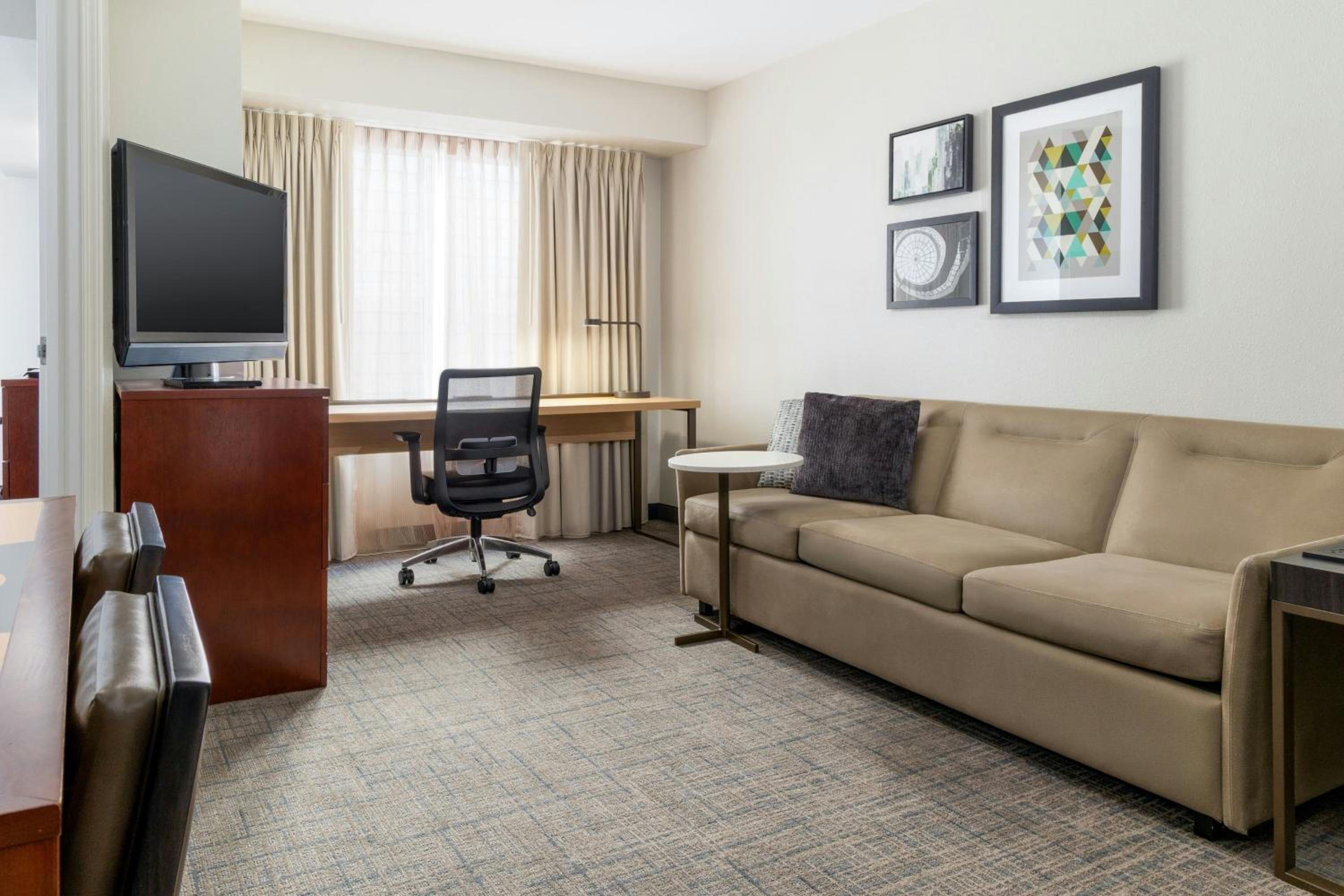 One-Bedroom King Suite with Sofa Bed - Mobility/Hearing Accessible with Roll-In Shower