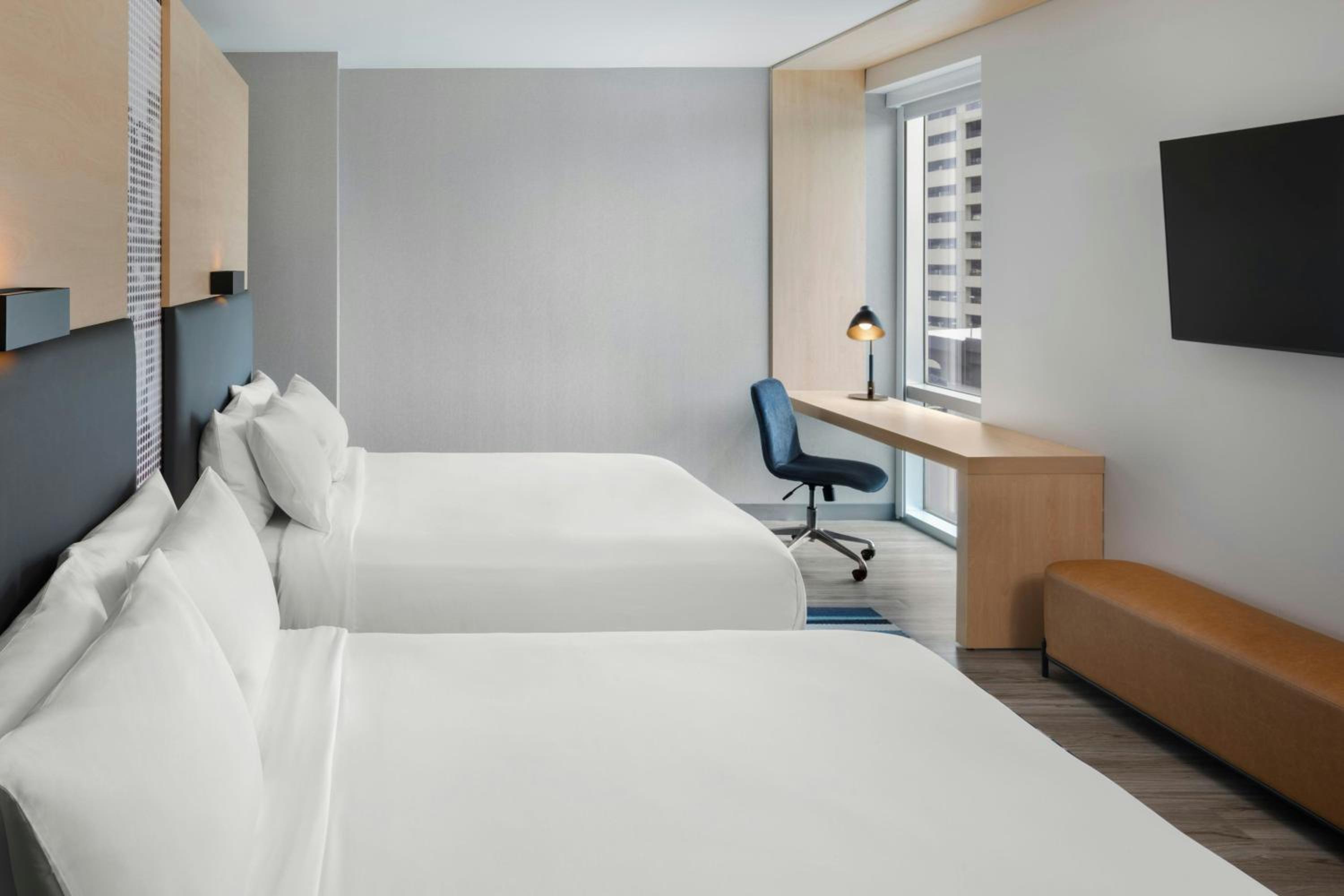 Queen Room with Two Queen Beds and Roll-in Shower - Mobility and Hearing Accessible photo 1