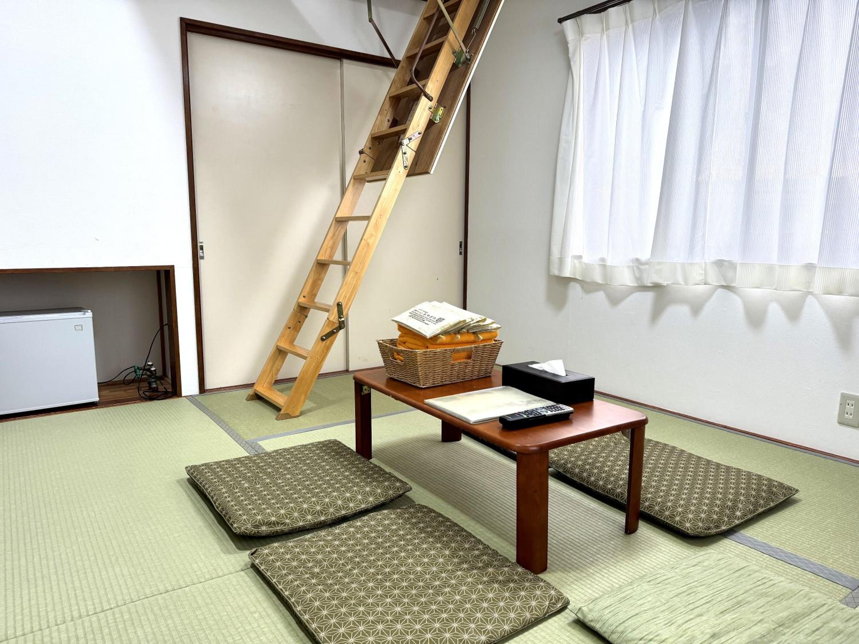 Economy Quadruple Room with Shared Bathroom