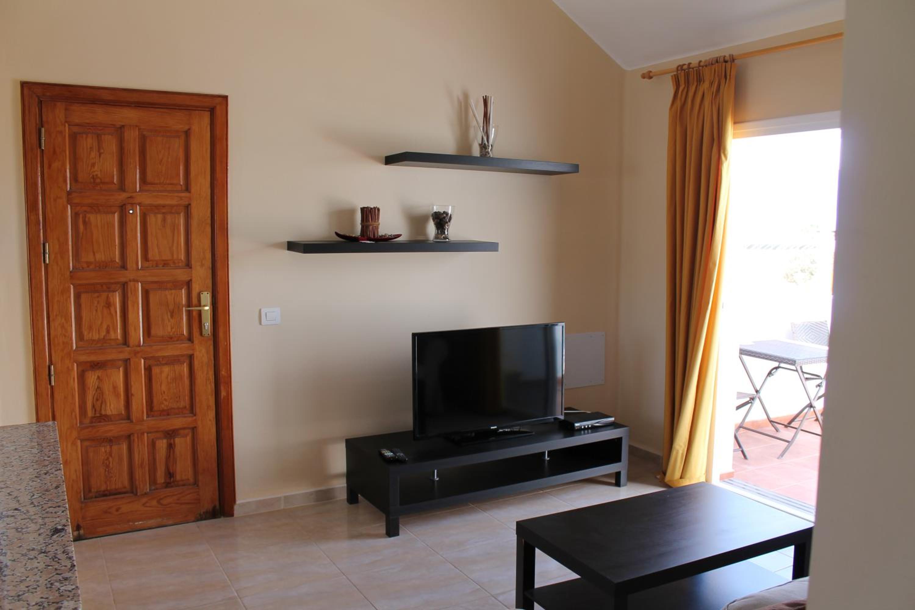 Apartamento de un dormitorio con vista a la piscina