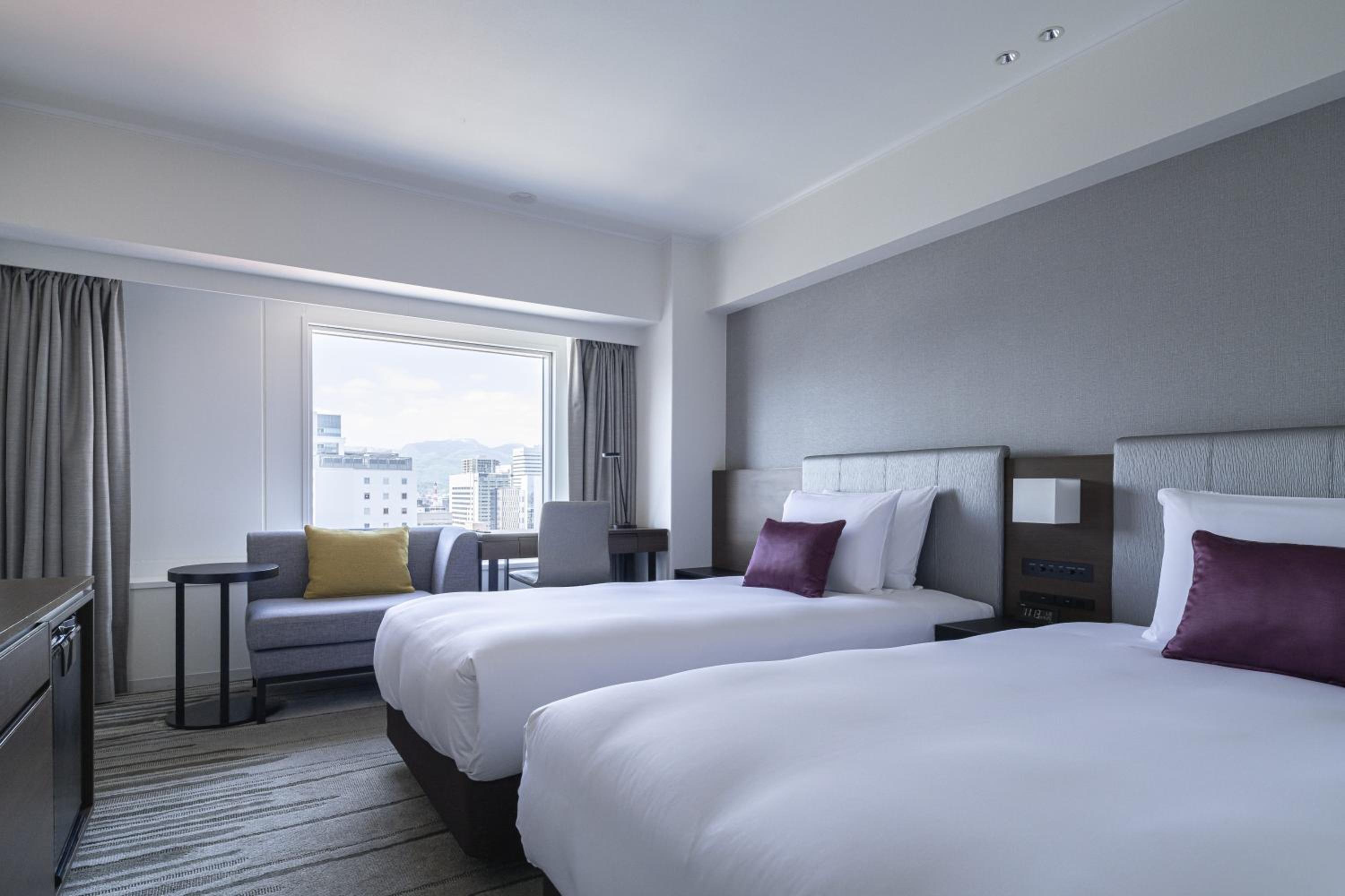 Standard Twin Room - High Floor - Photo 1
