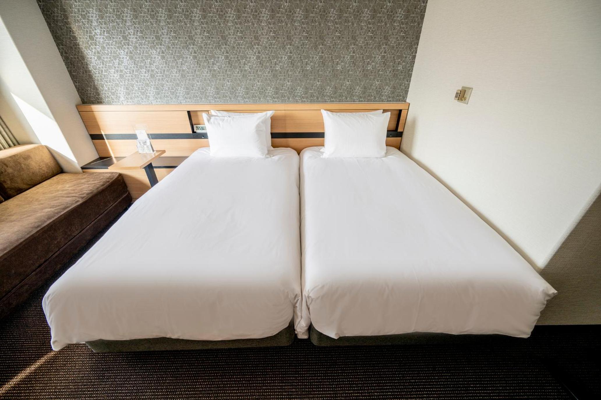 Standard Corner Twin Room - Mid Floor - Photo 1