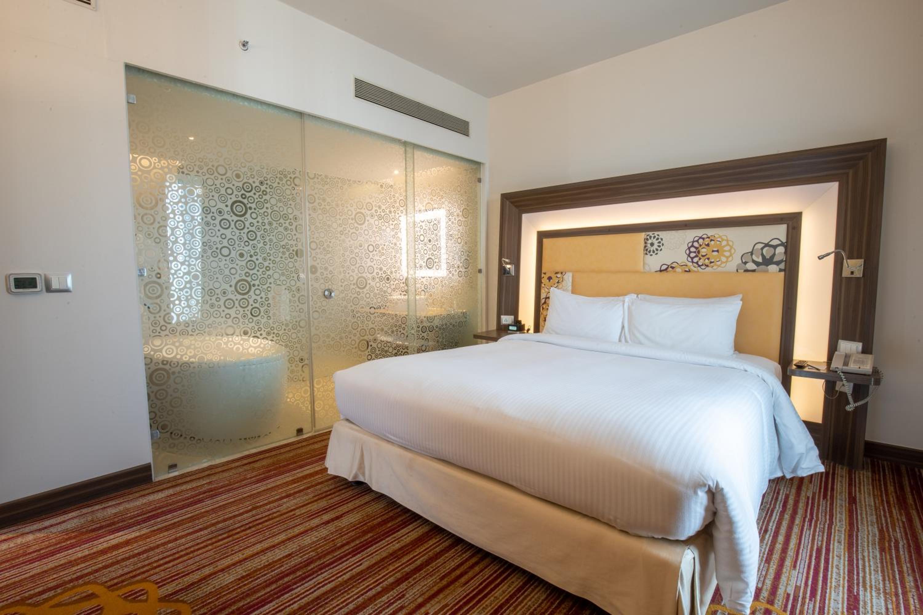 Junior King Suite with Complimentary IMFL from 6:00 pm to 8 pm at Barcode and Two Way Airport Transfer - Photo 1