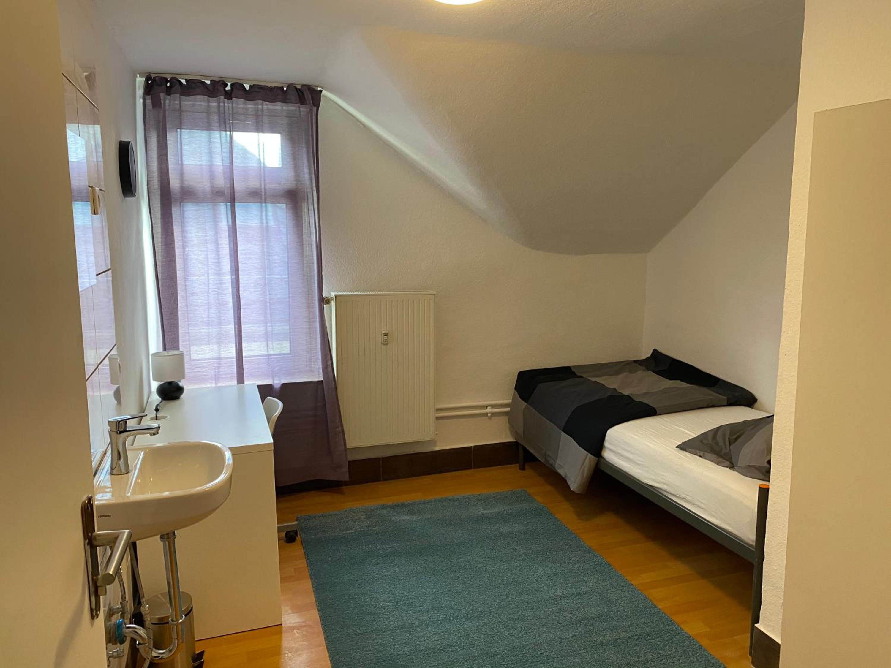 Single Room with Shared Shower and Toilet