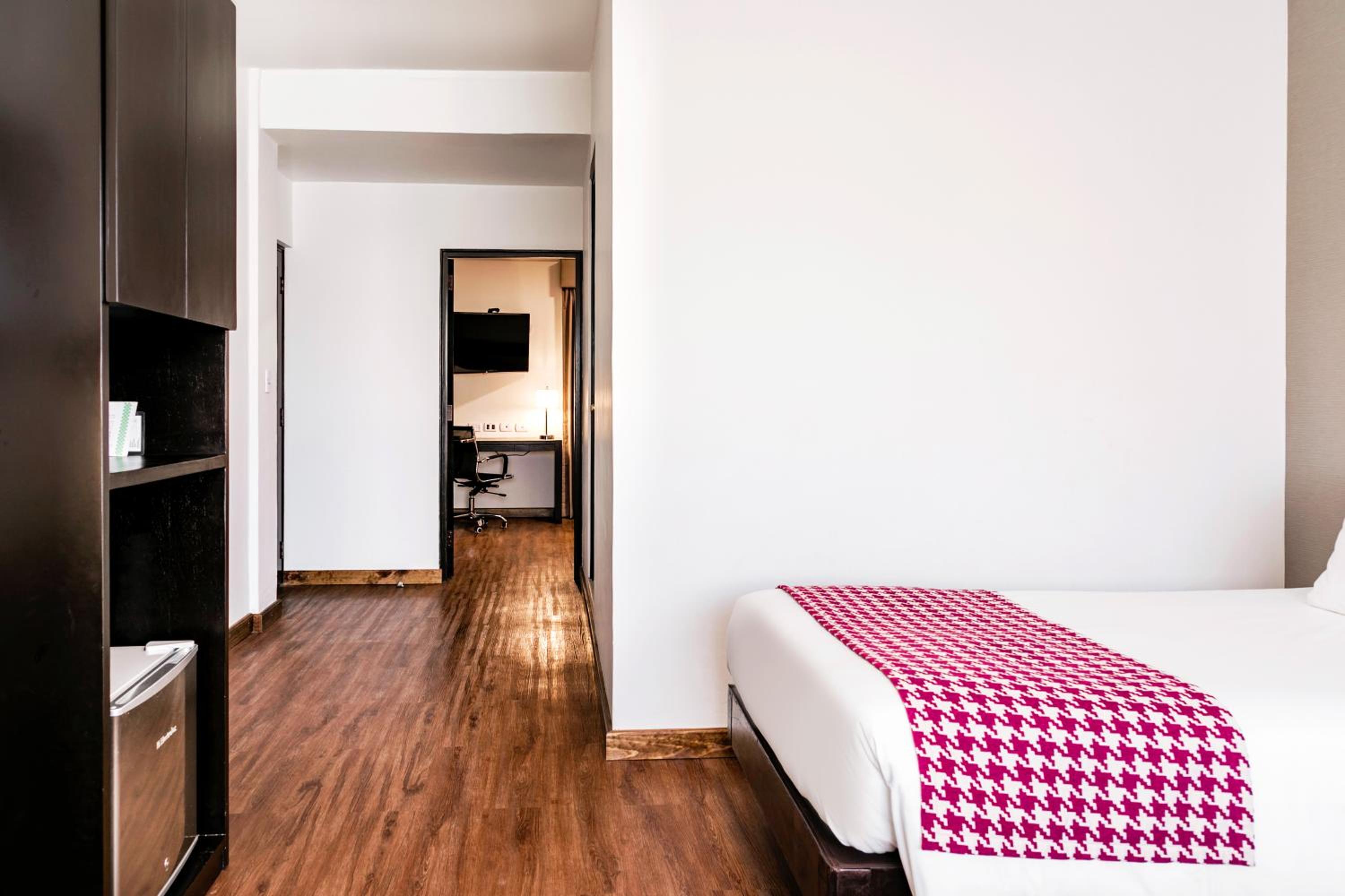 Family Suite with One Queen and Two Double Beds - Non-Smoking - Photo 1