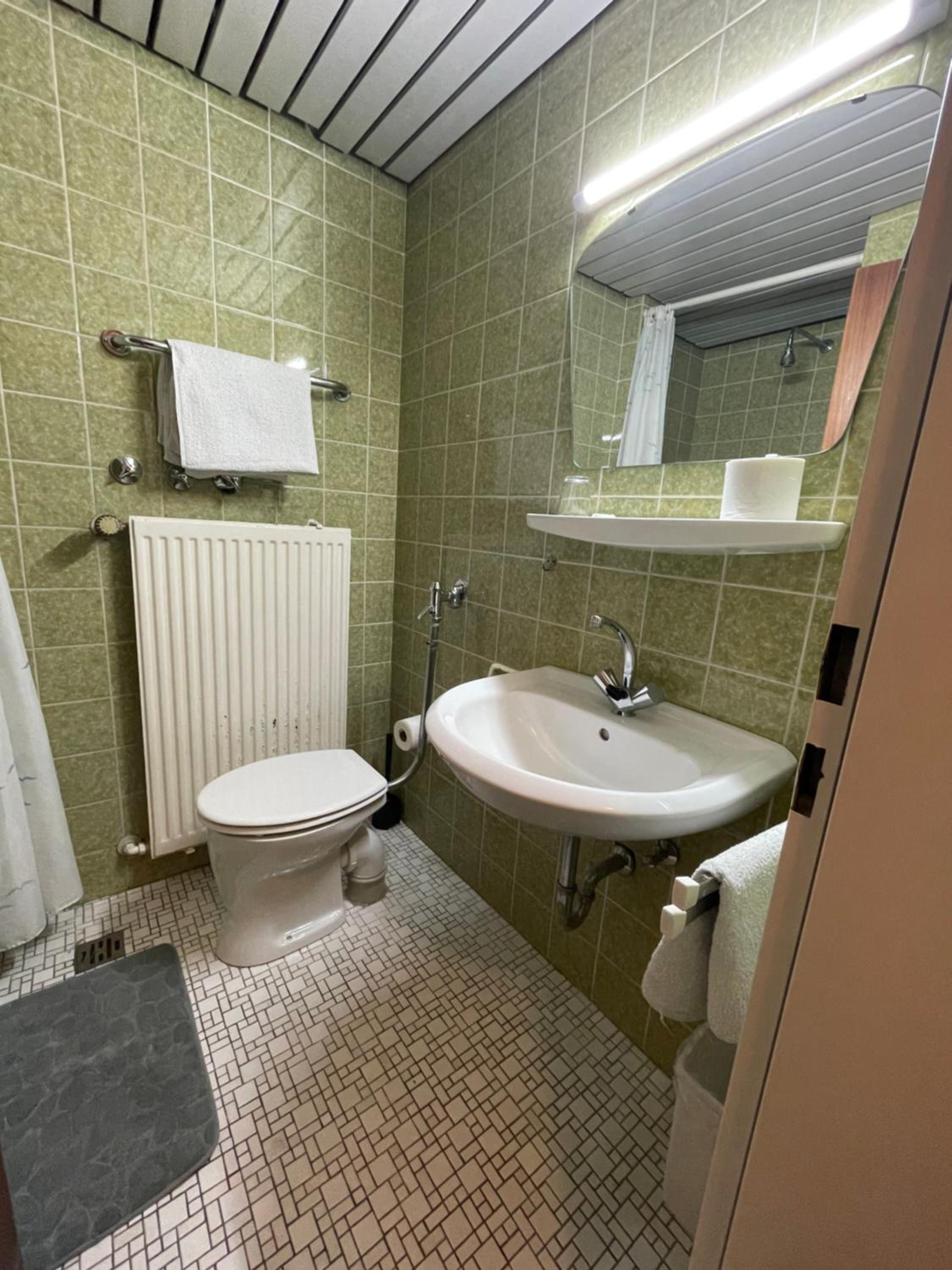 Apartment with Balcony - Photo 17