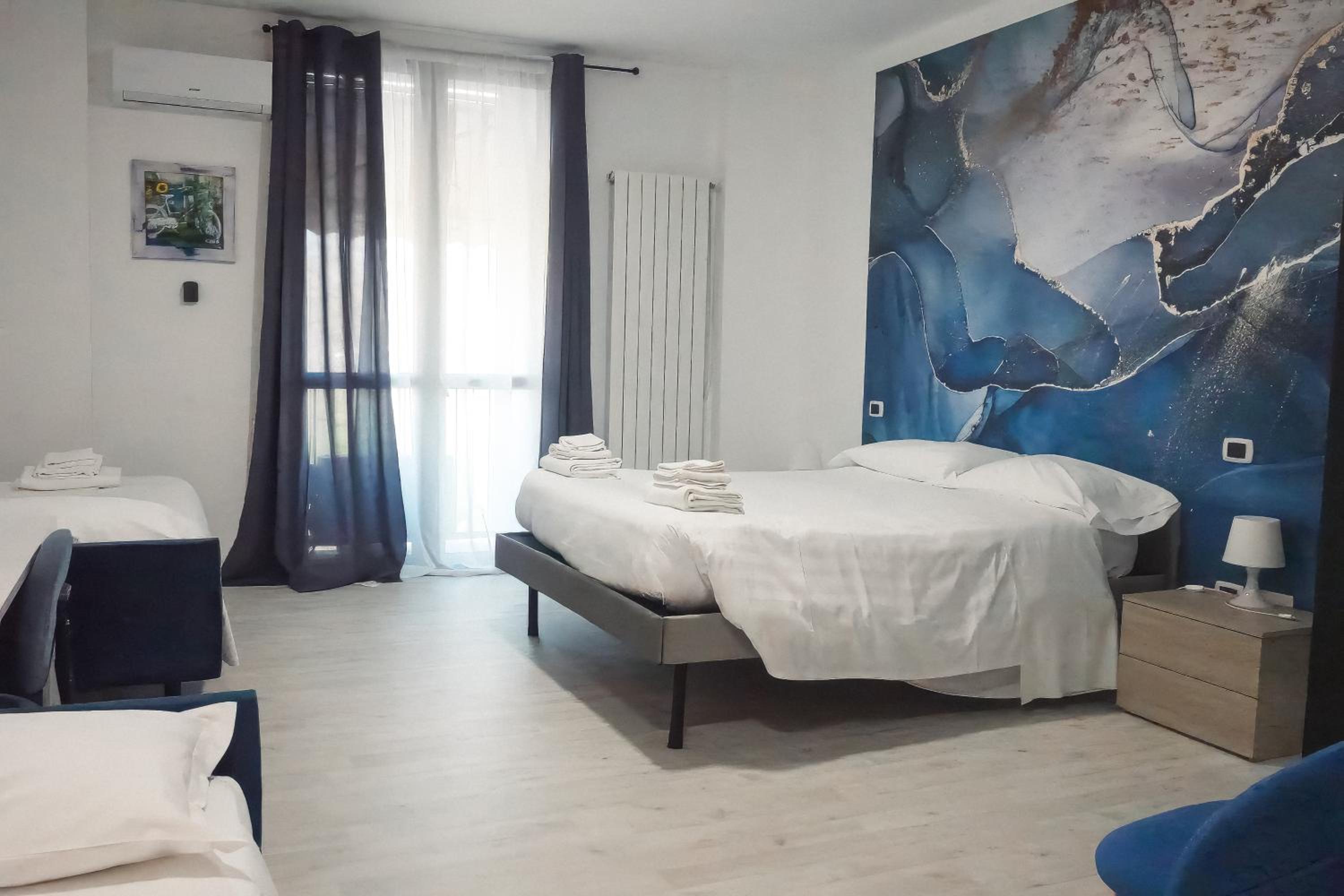 Quadruple Room - Photo 7