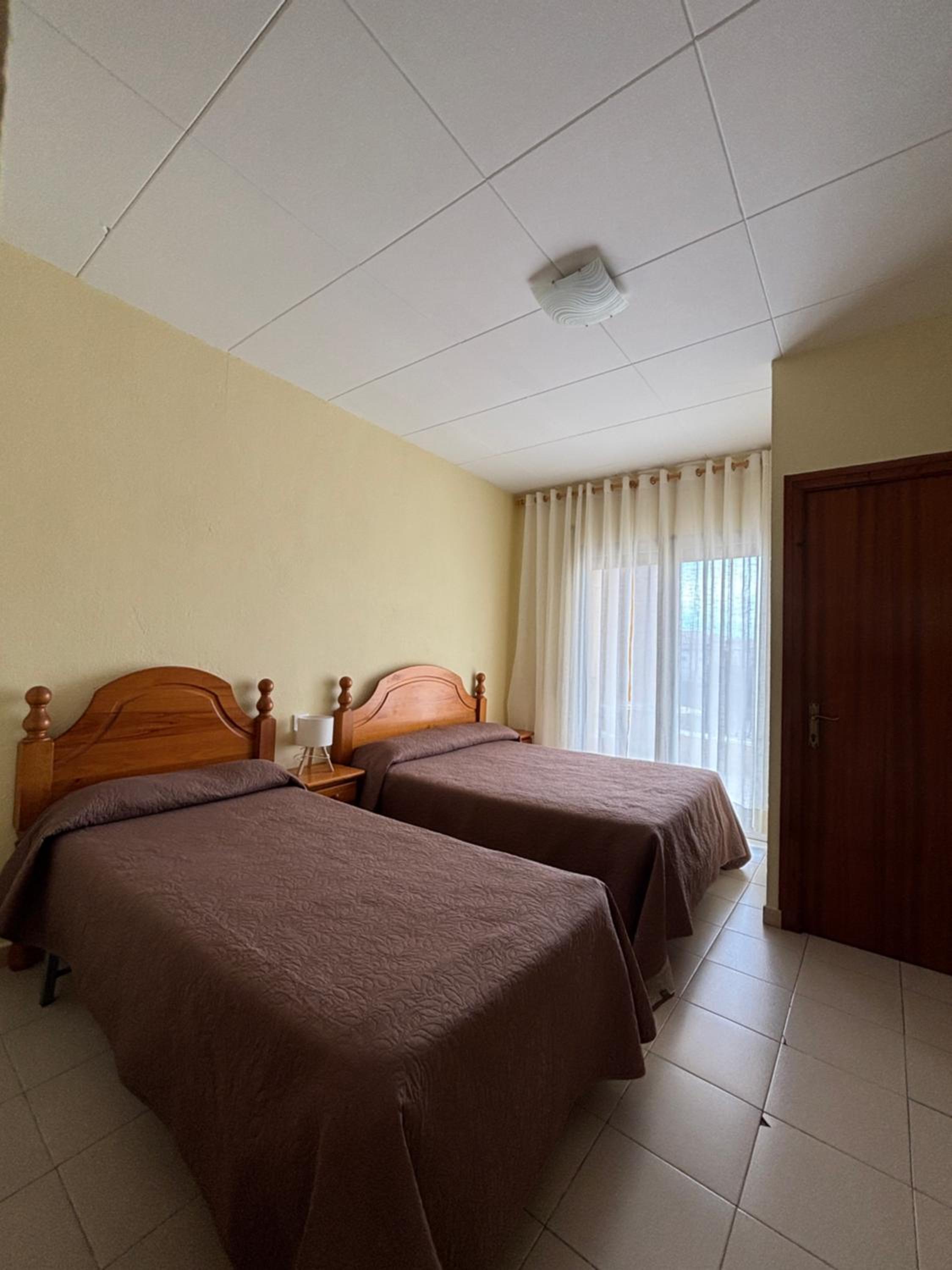 Habitación Triple con Balcón