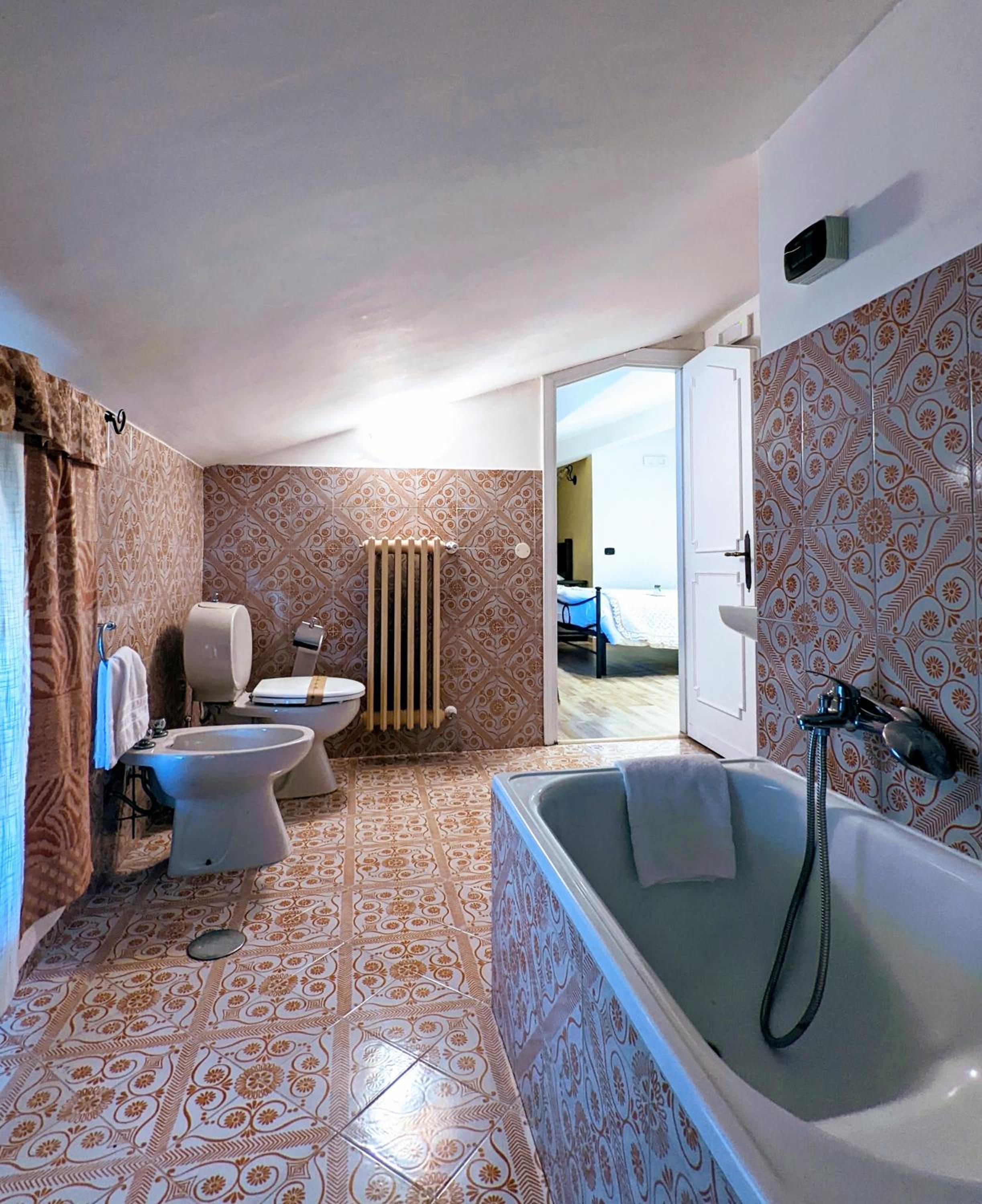 Quadruple Room with Balcony