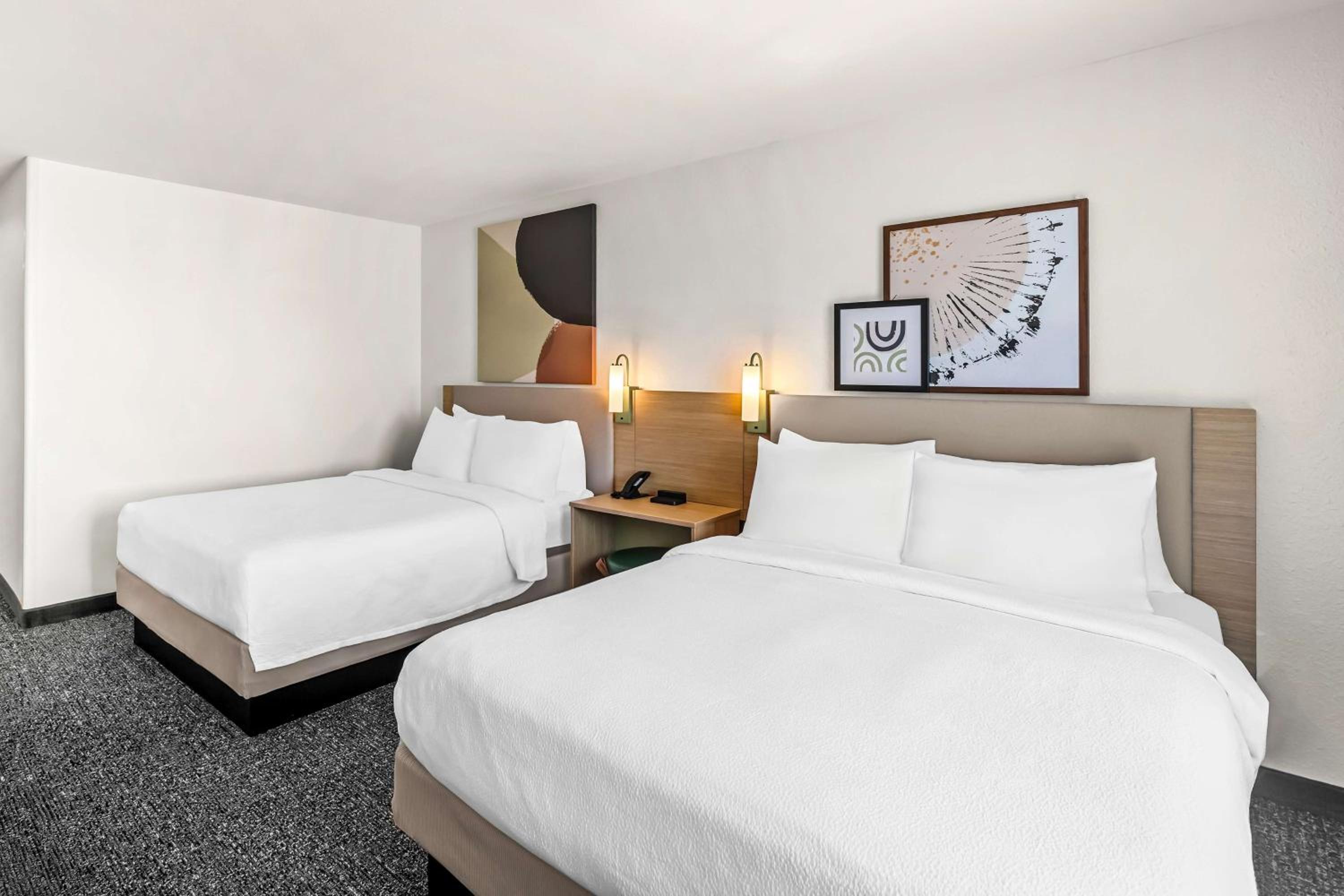 Queen Room with Two Queen Beds and Mobility Accessible Tub - Photo 1