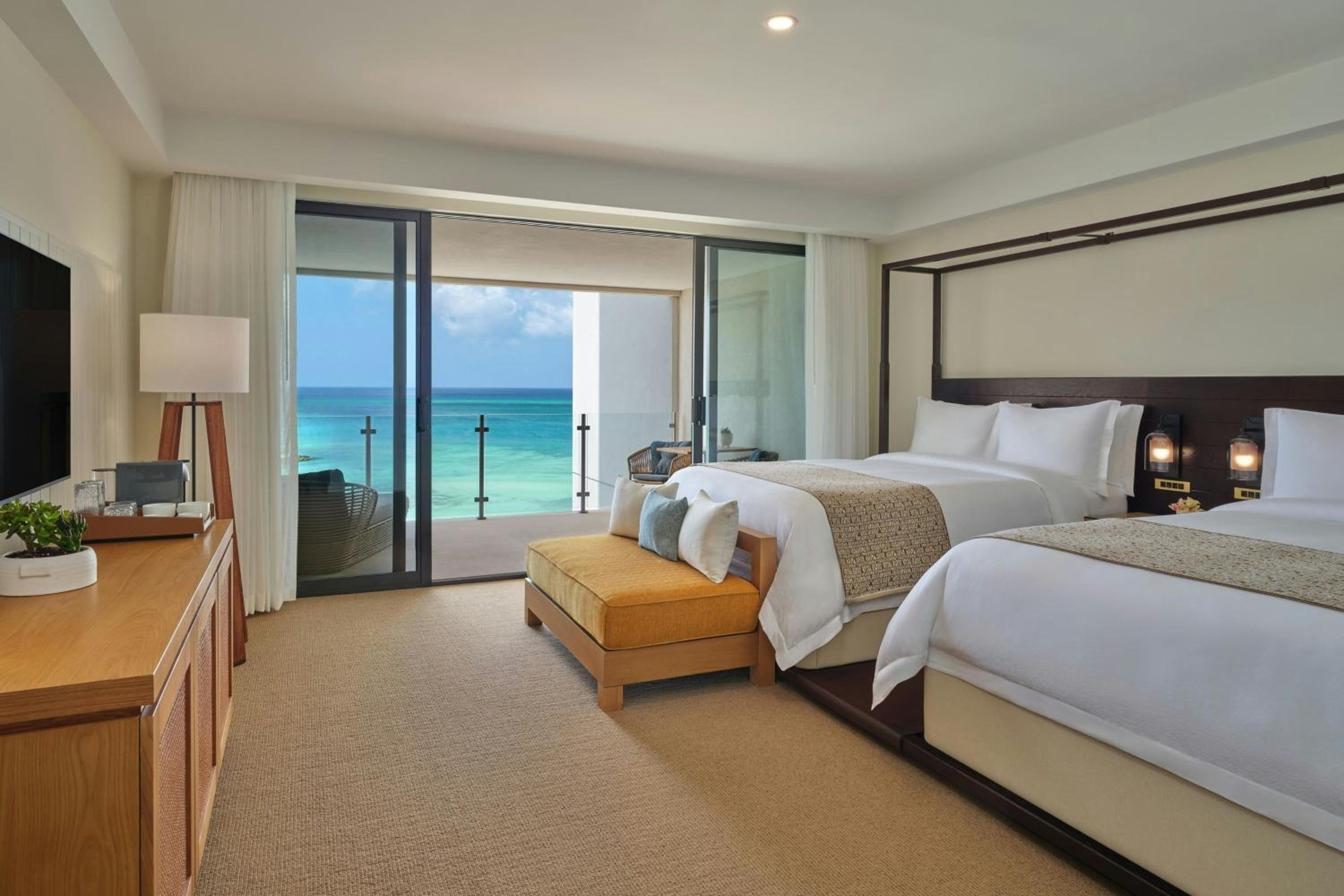 Deluxe Double Room with Two Double Beds, Balcony and Partial Ocean View