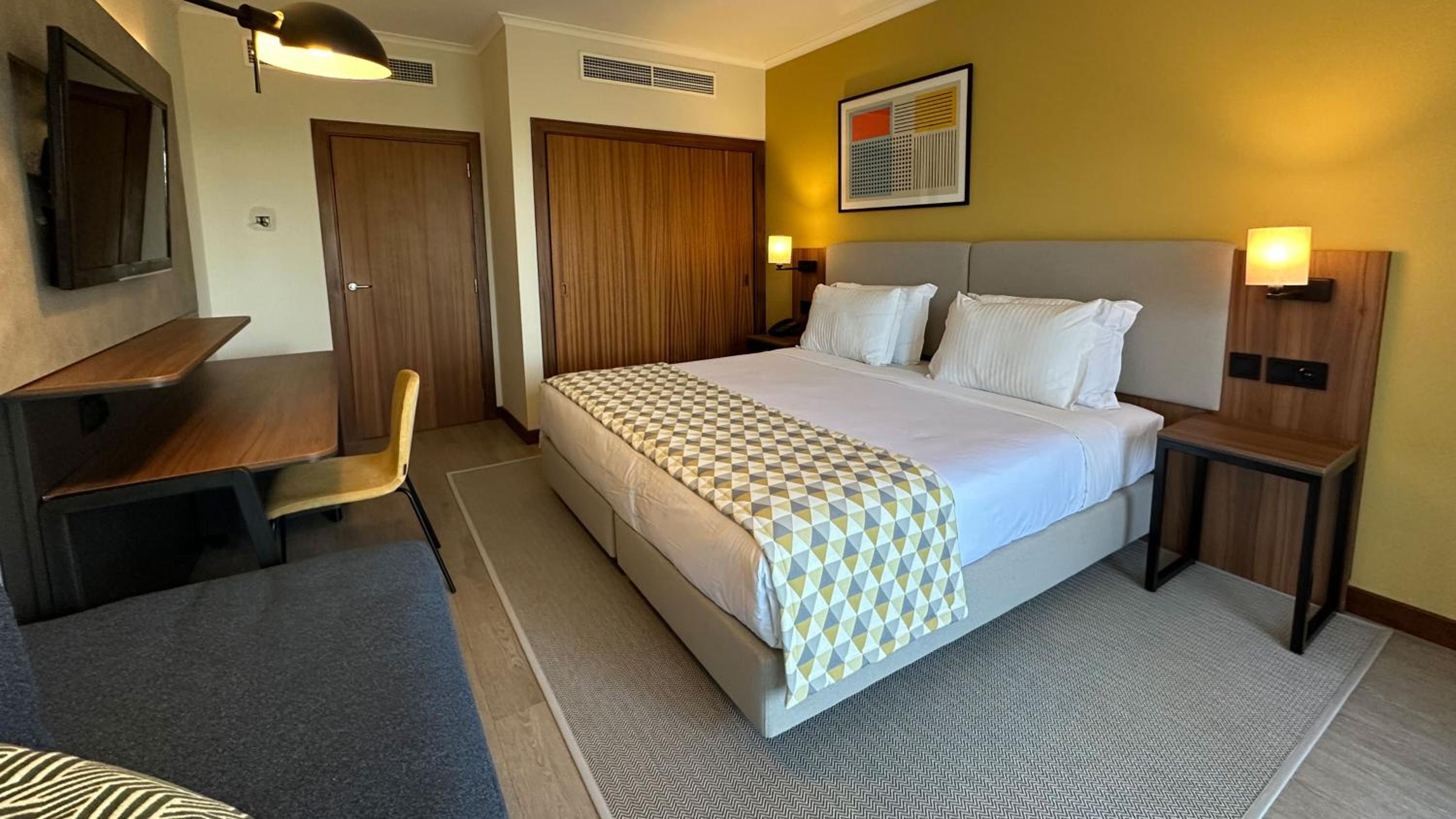 Standard Double Room with Furnished Balcony and Single Sofa Bed