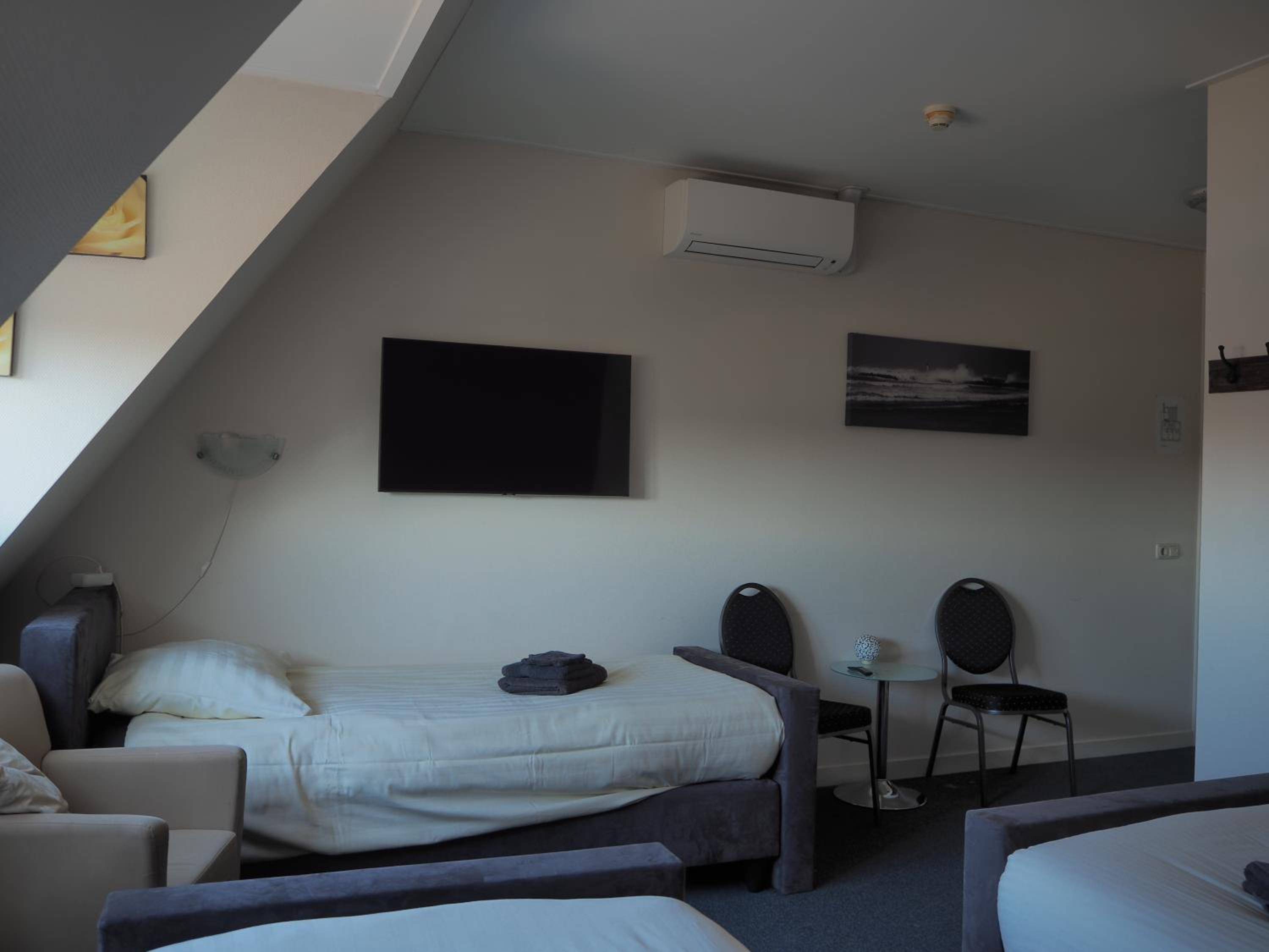 Deluxe Triple Room - Photo 5