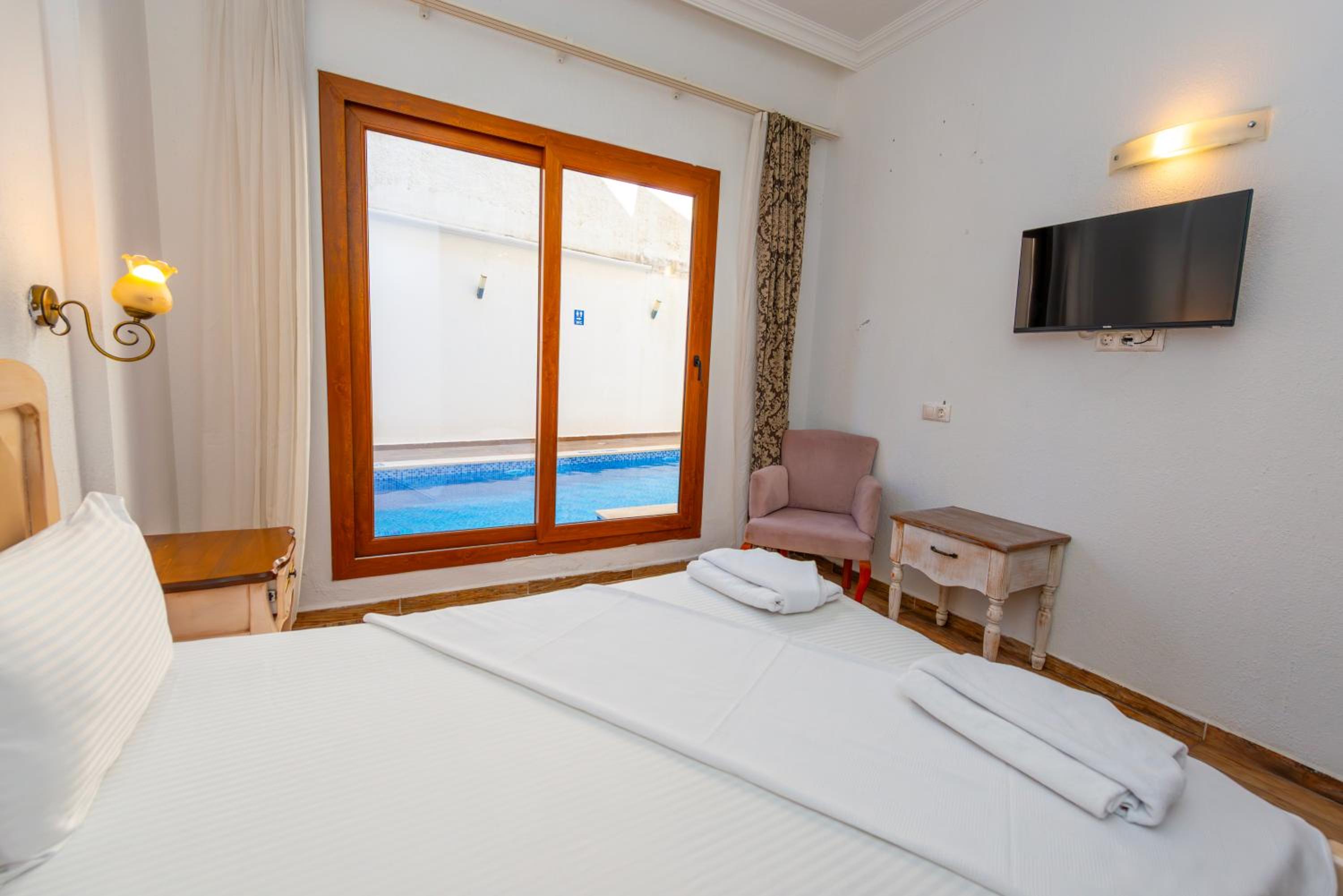 Double or Twin Room with Pool View - Photo 1