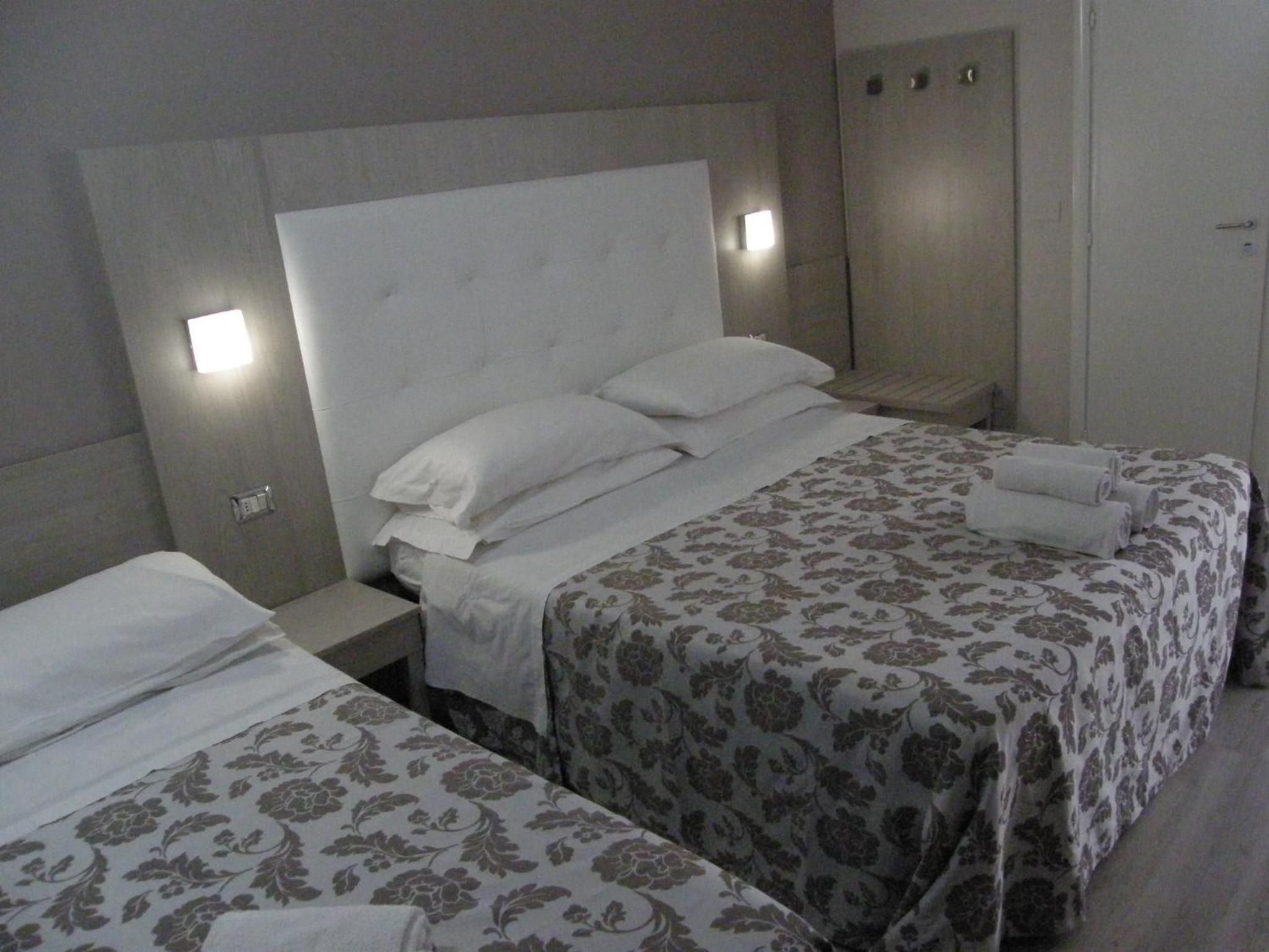 Economy Quadruple Room (2 Adults + 2 Children) photo 2