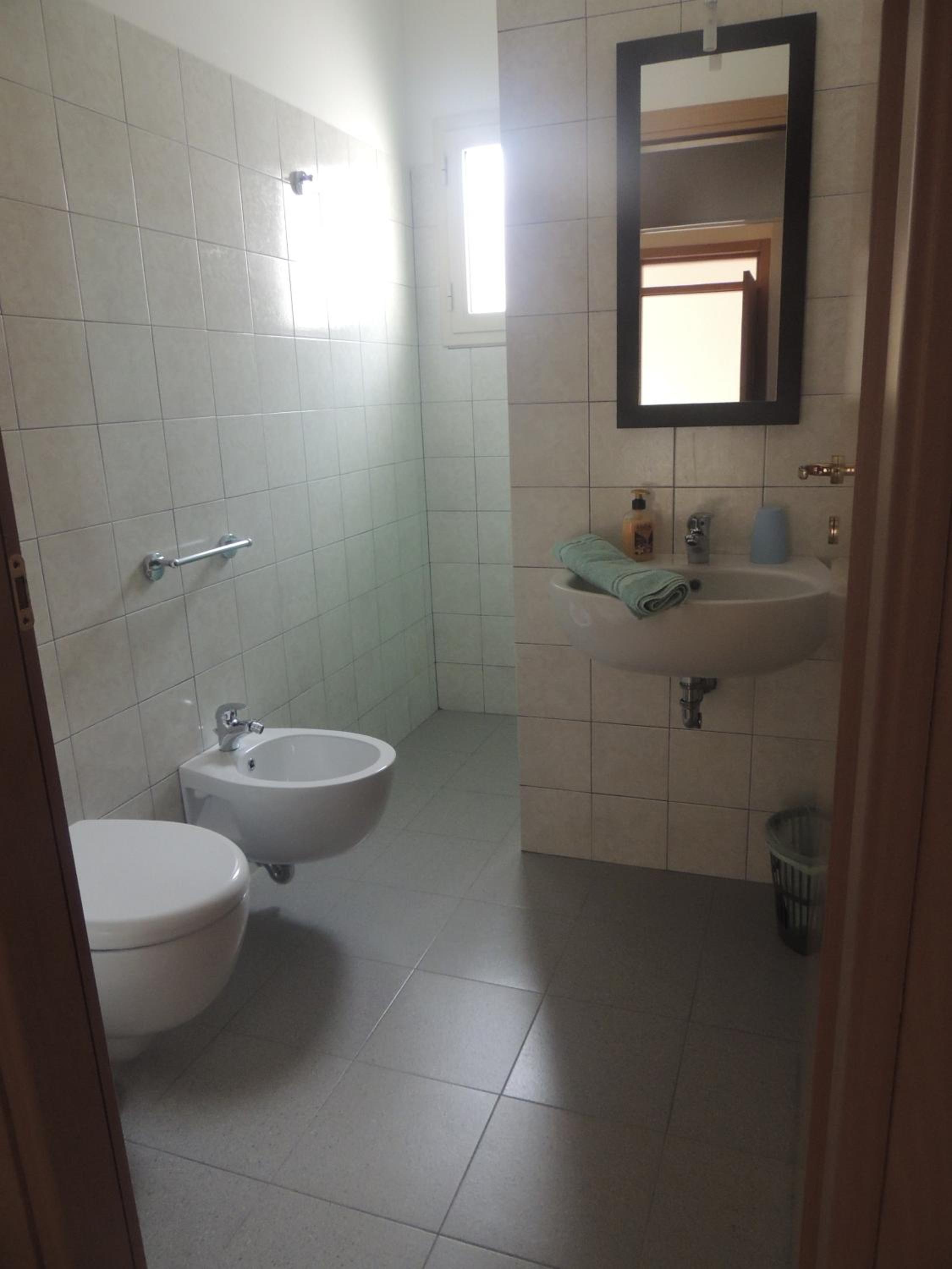 Three-Bedroom Apartment with Balcony photo 2