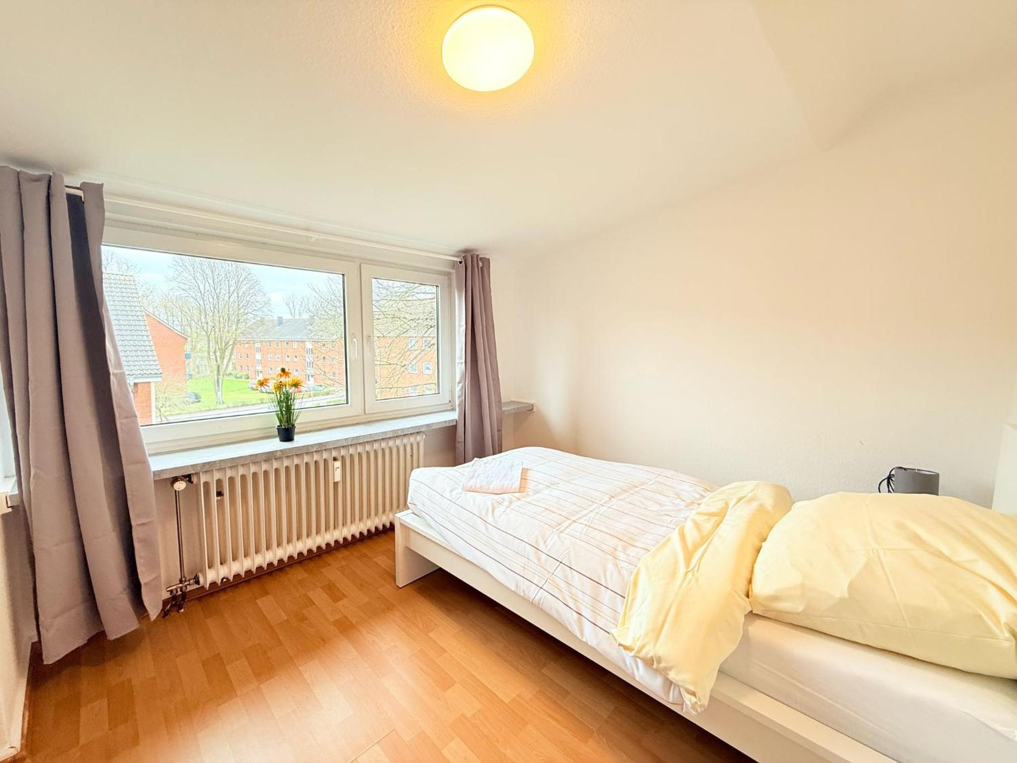 Three-Bedroom Apartment with Balcony photo 3