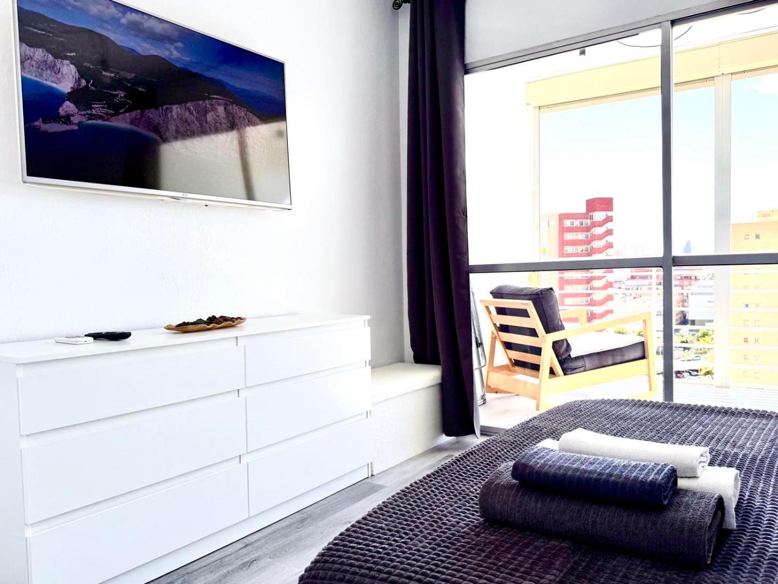 One-Bedroom Apartment with Balcony and City View