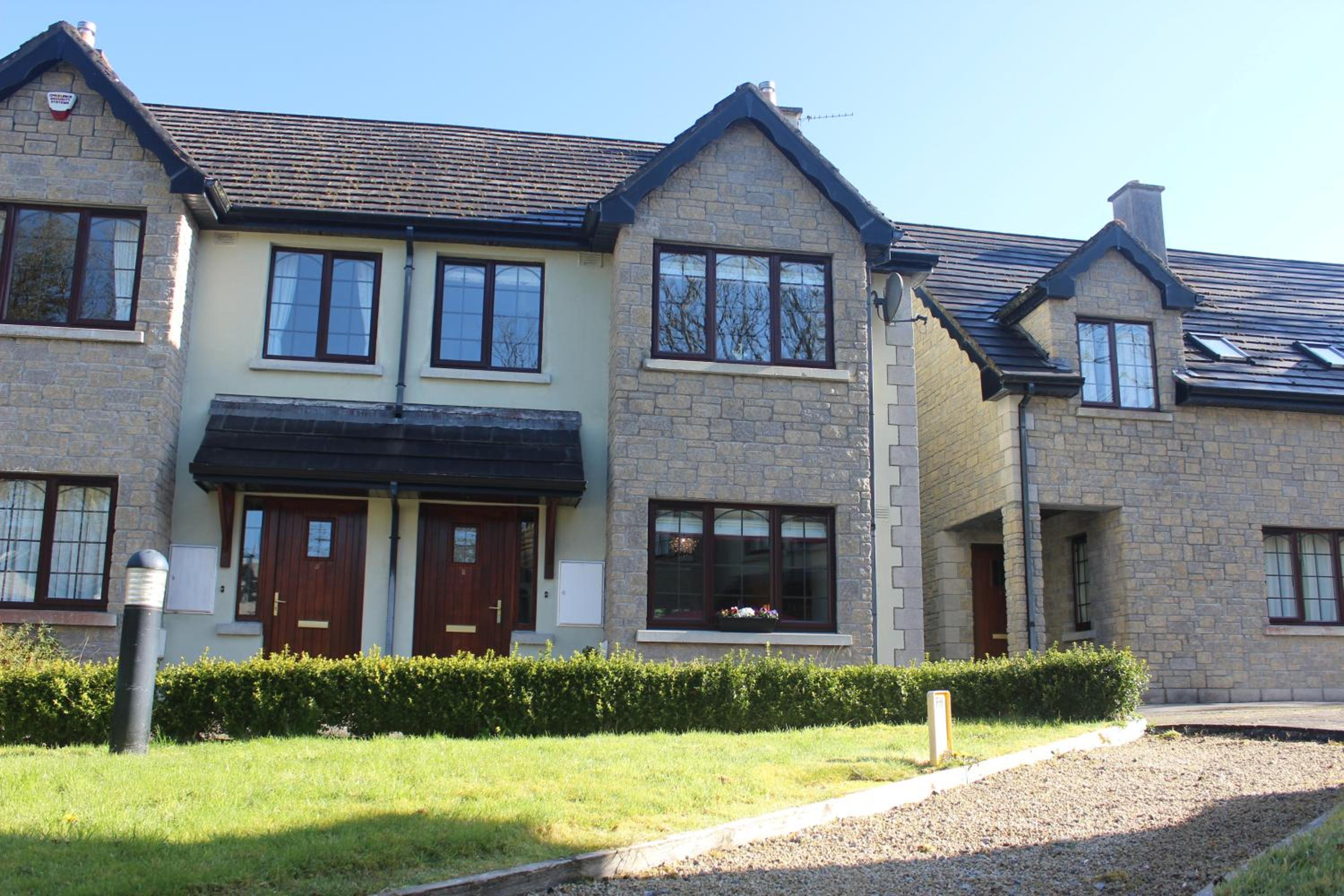 Three-Bedroom House - Photo 39