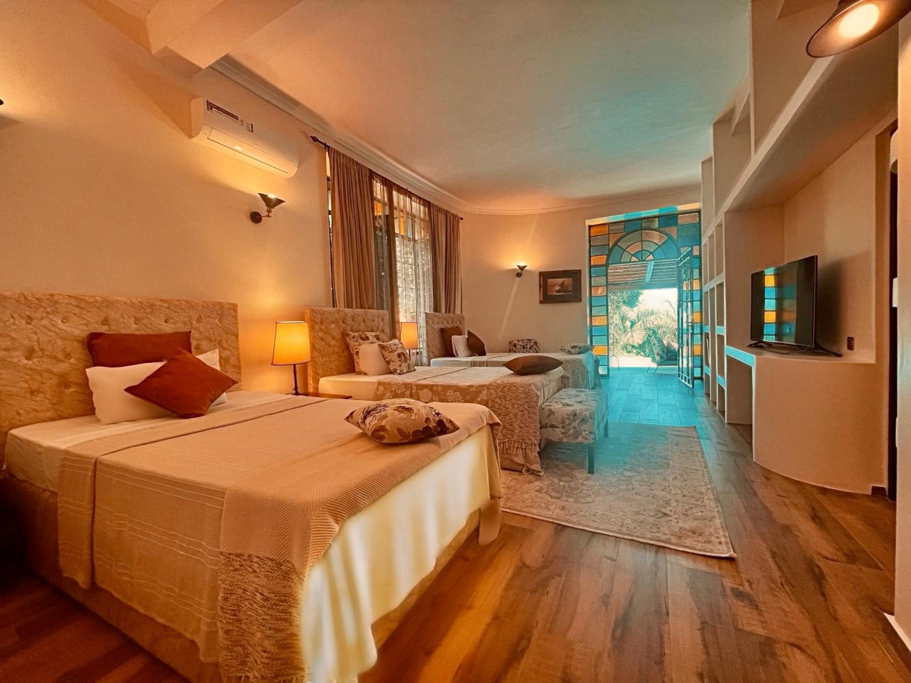 Deluxe Triple Room - Photo 2