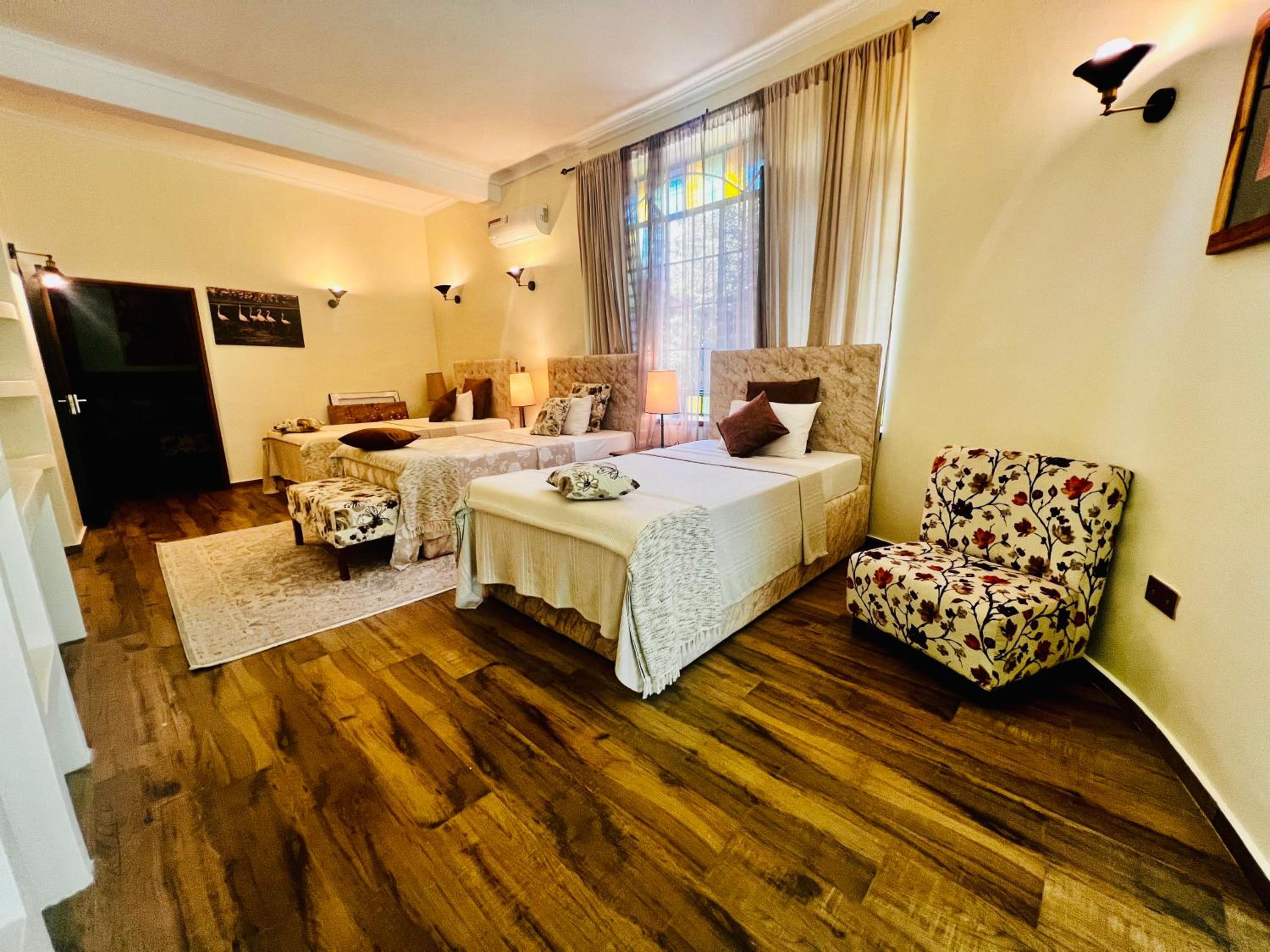 Deluxe Triple Room - Photo 1