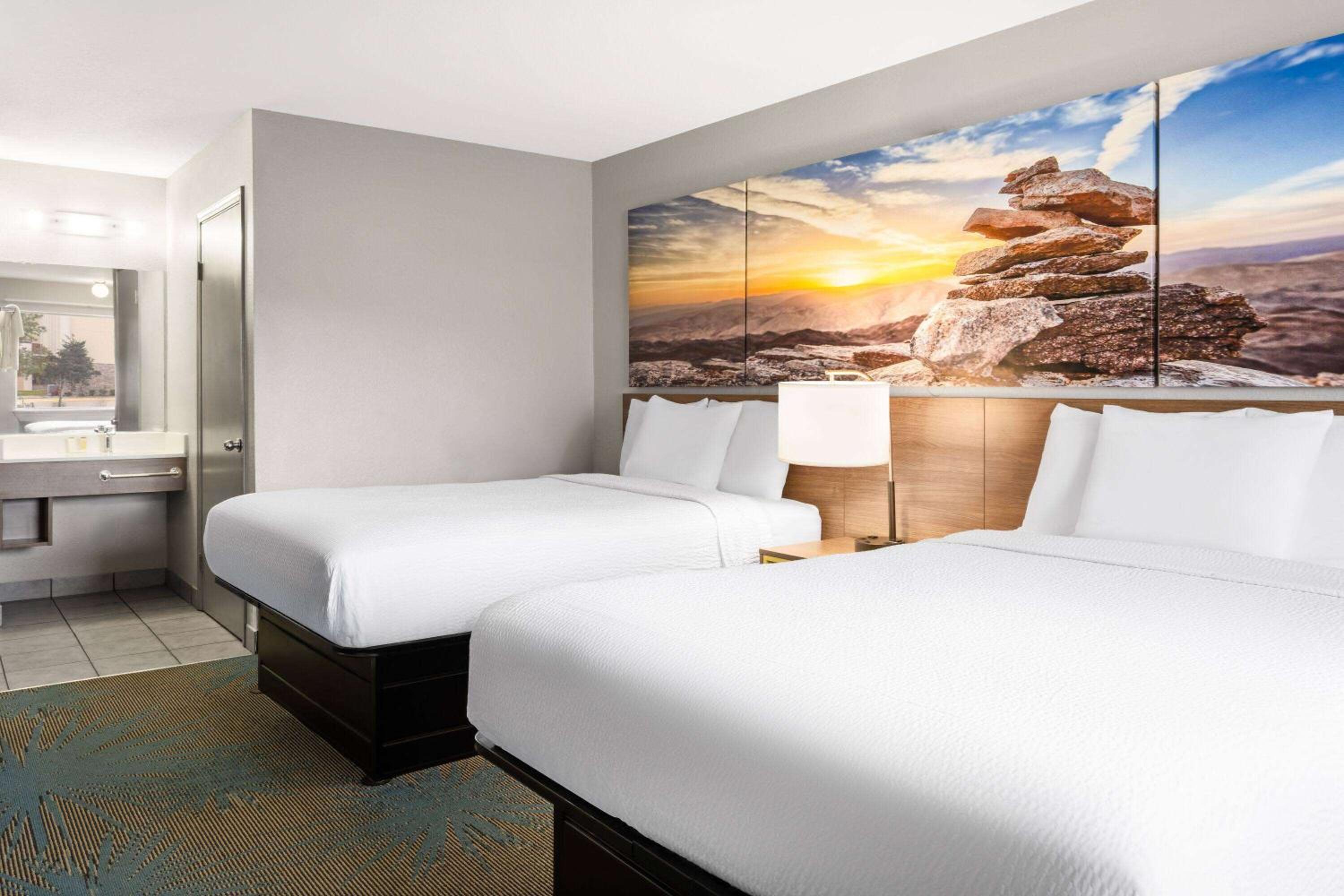 Queen Room with Two Queen Beds - Photo 1