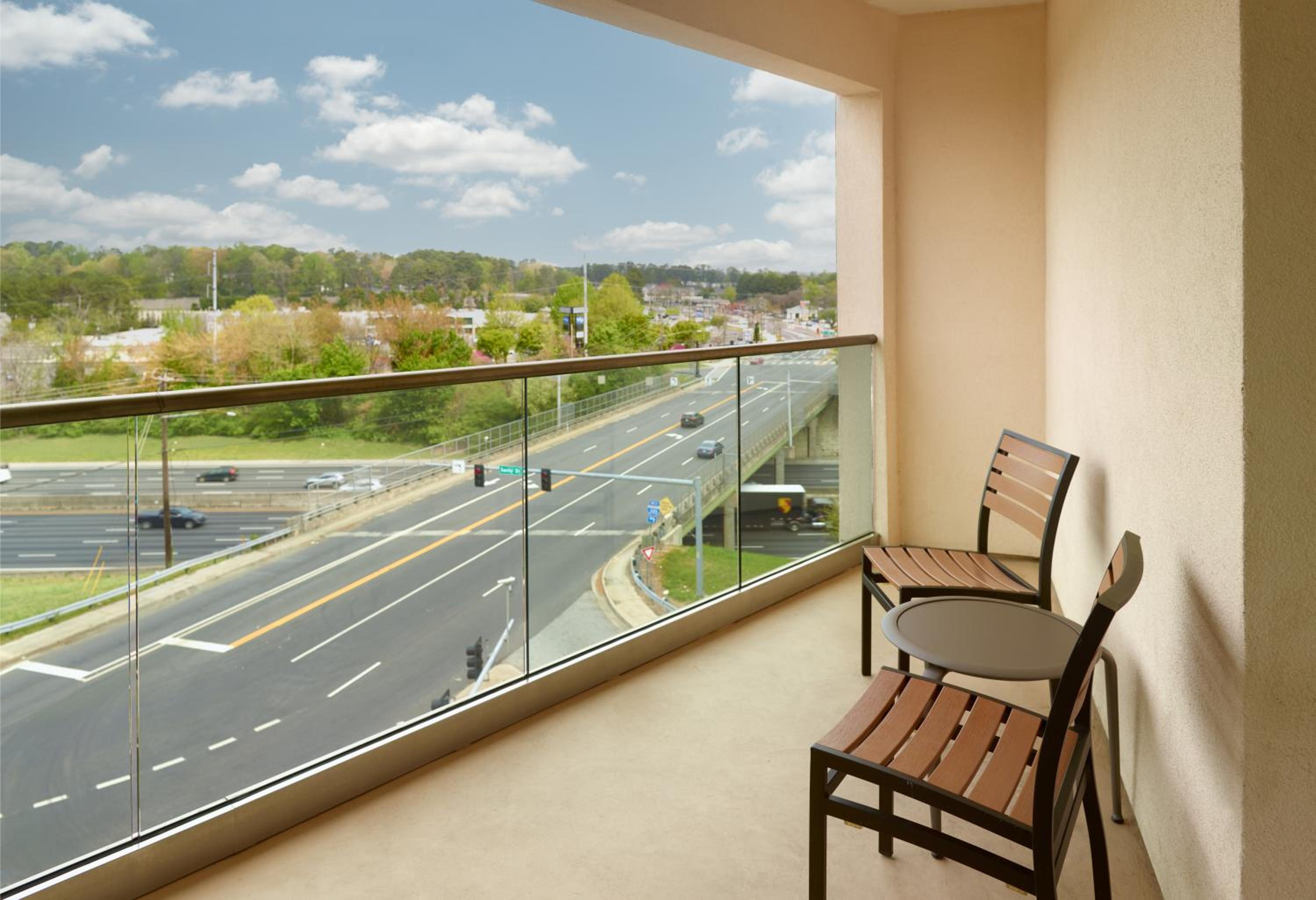 One-Bedroom King Suite with Sofa Bed/City View/Balcony - Mobility/Hearing Accessible with Tub
