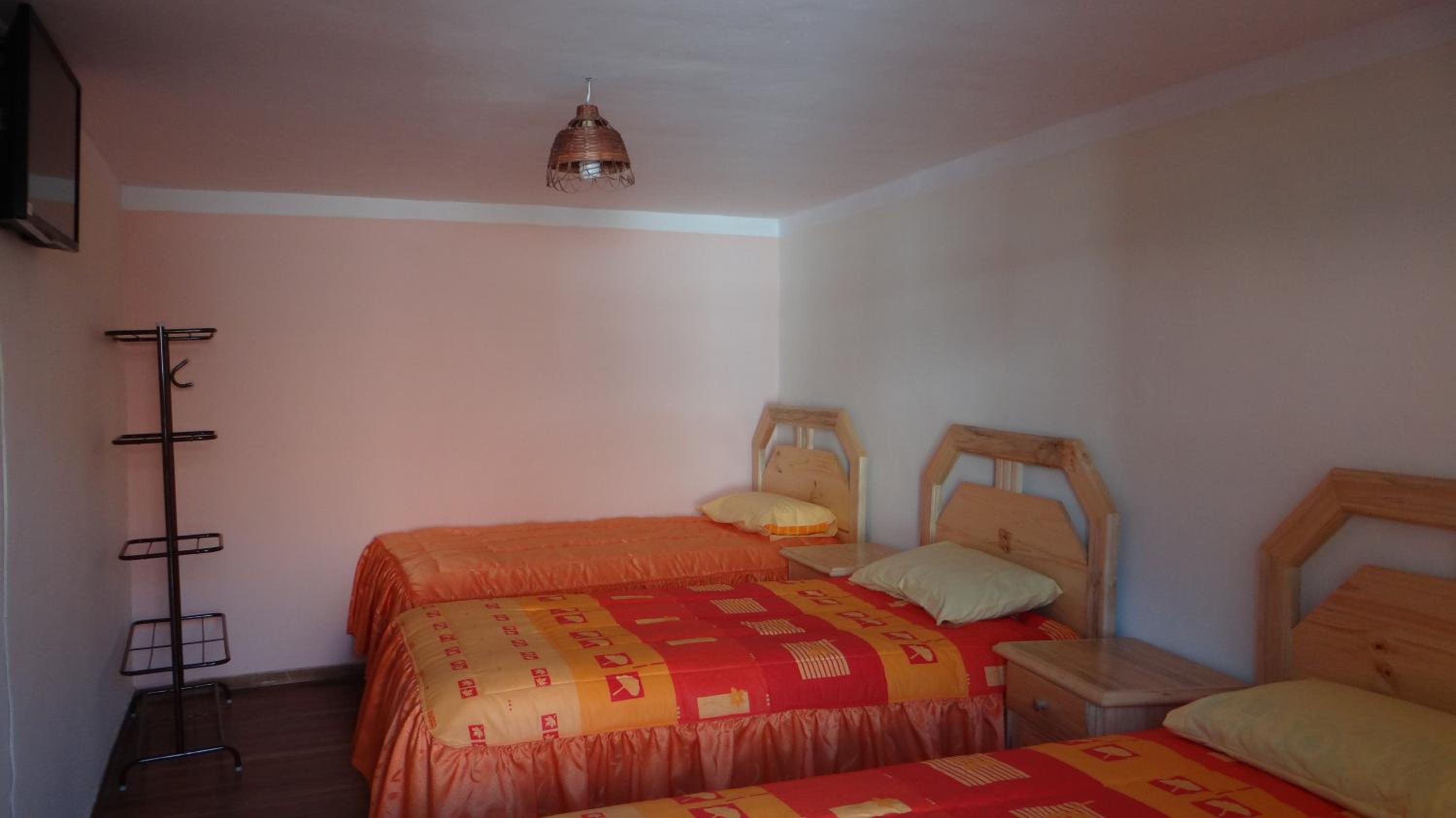 Basic Triple Room with Shared Bathroom photo 3