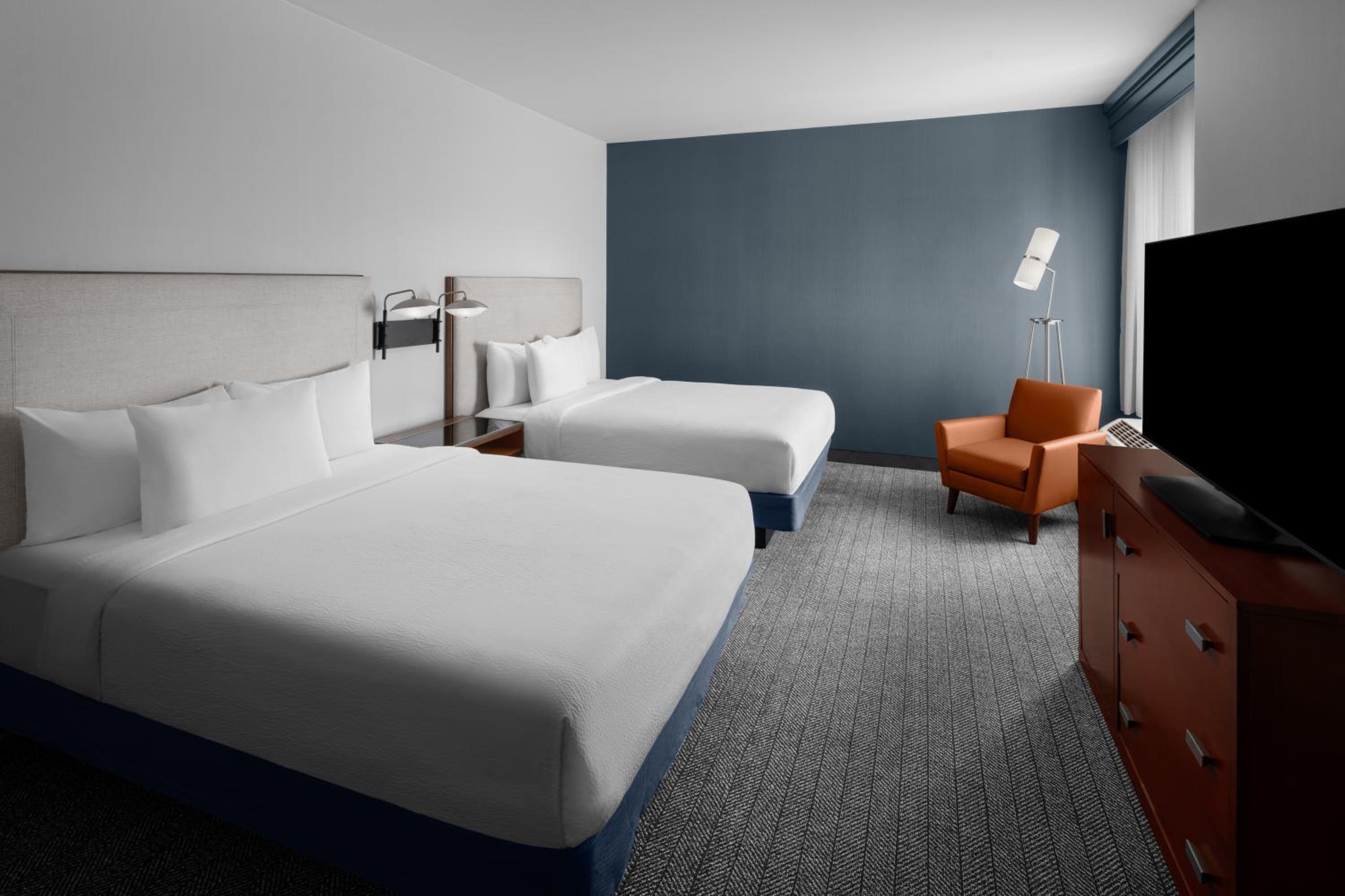 Suite with Two Queen Beds and Two Sofa Beds - Photo 1