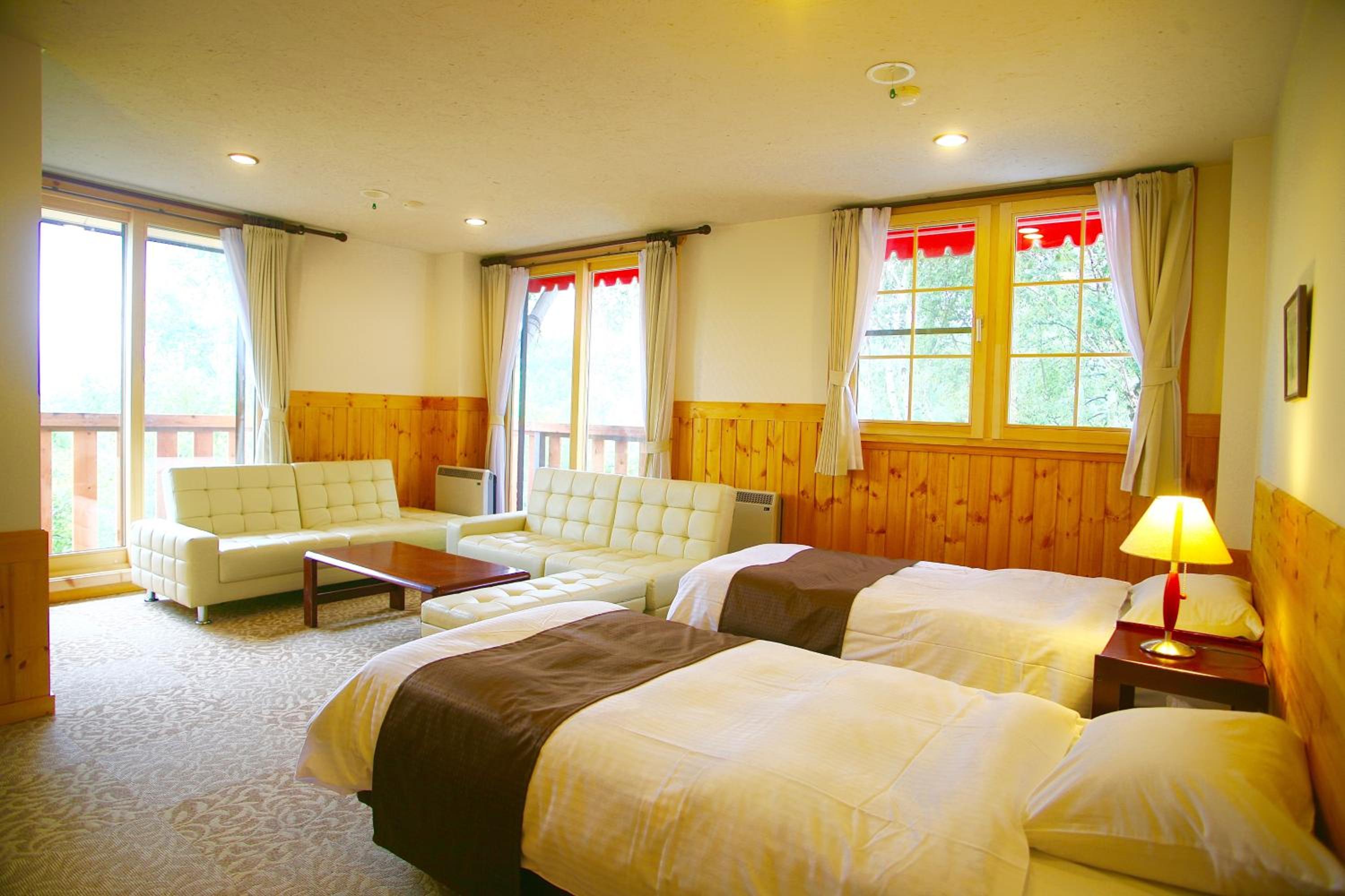 Suite with Balcony - No Pets - Photo 1