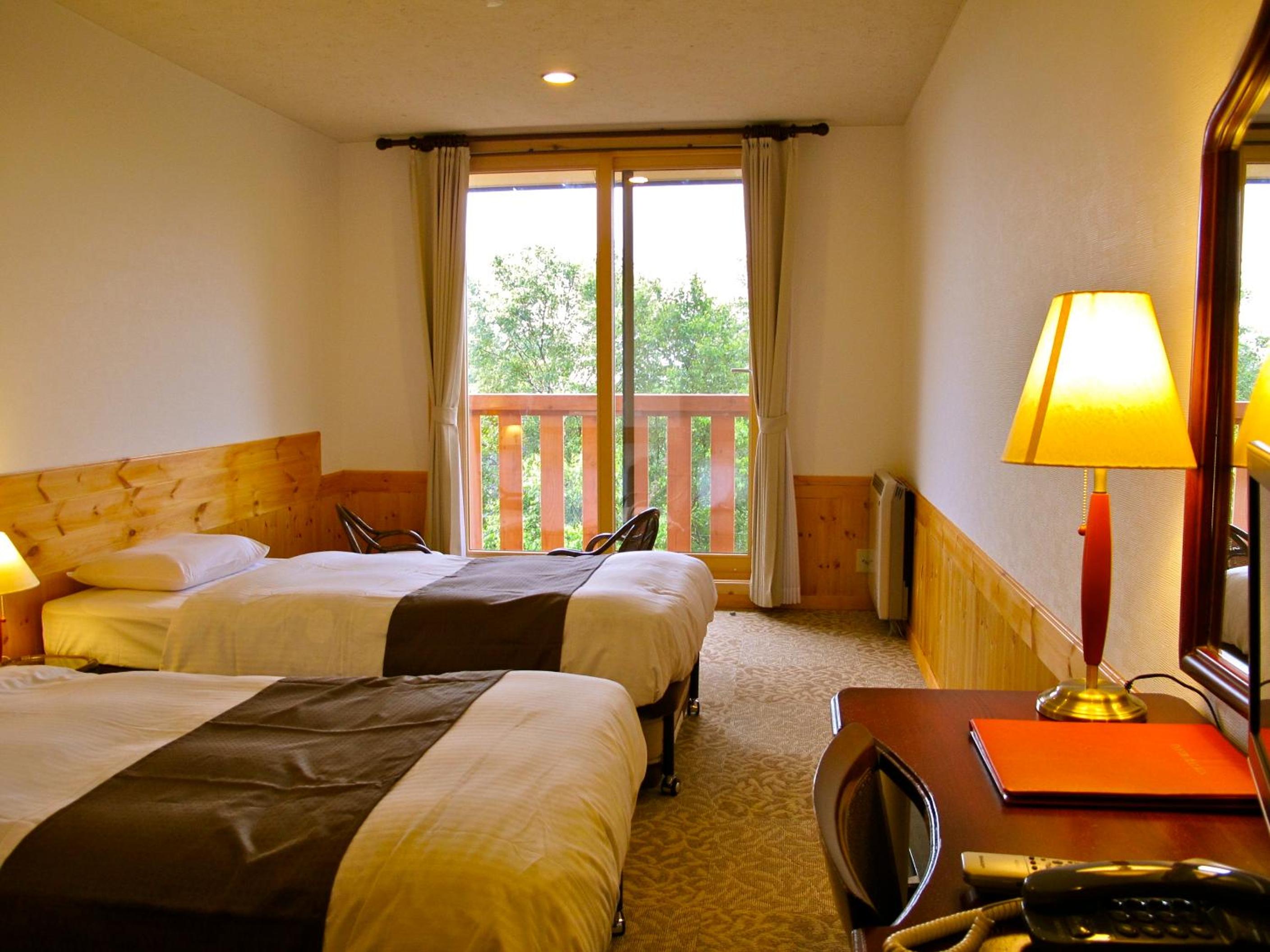 Economy Room with Balcony - No Pets - Photo 1