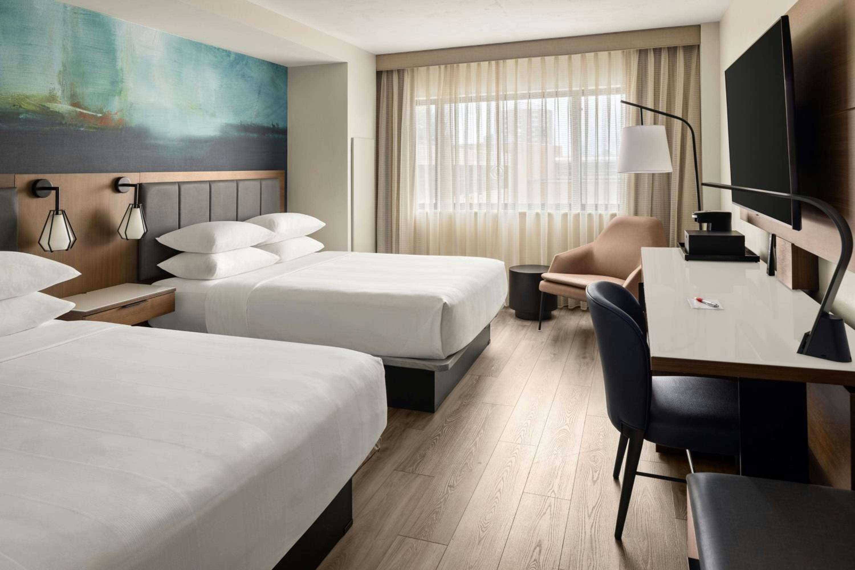 Double Queen Room with Two Queen Beds and City View - Hearing Accessible - Photo 1