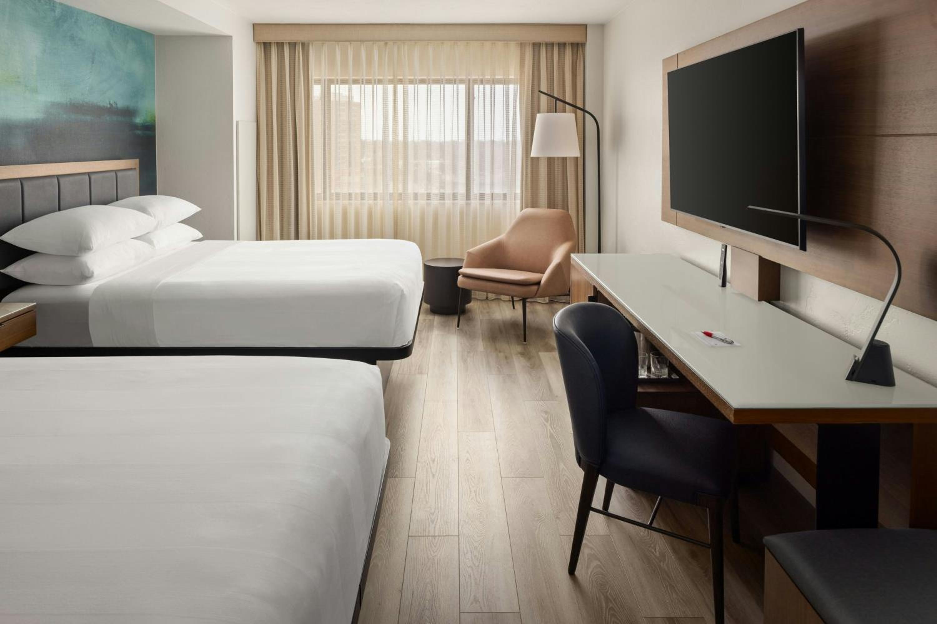 Double Queen Room with Two Queen Beds and Waterview - Photo 1