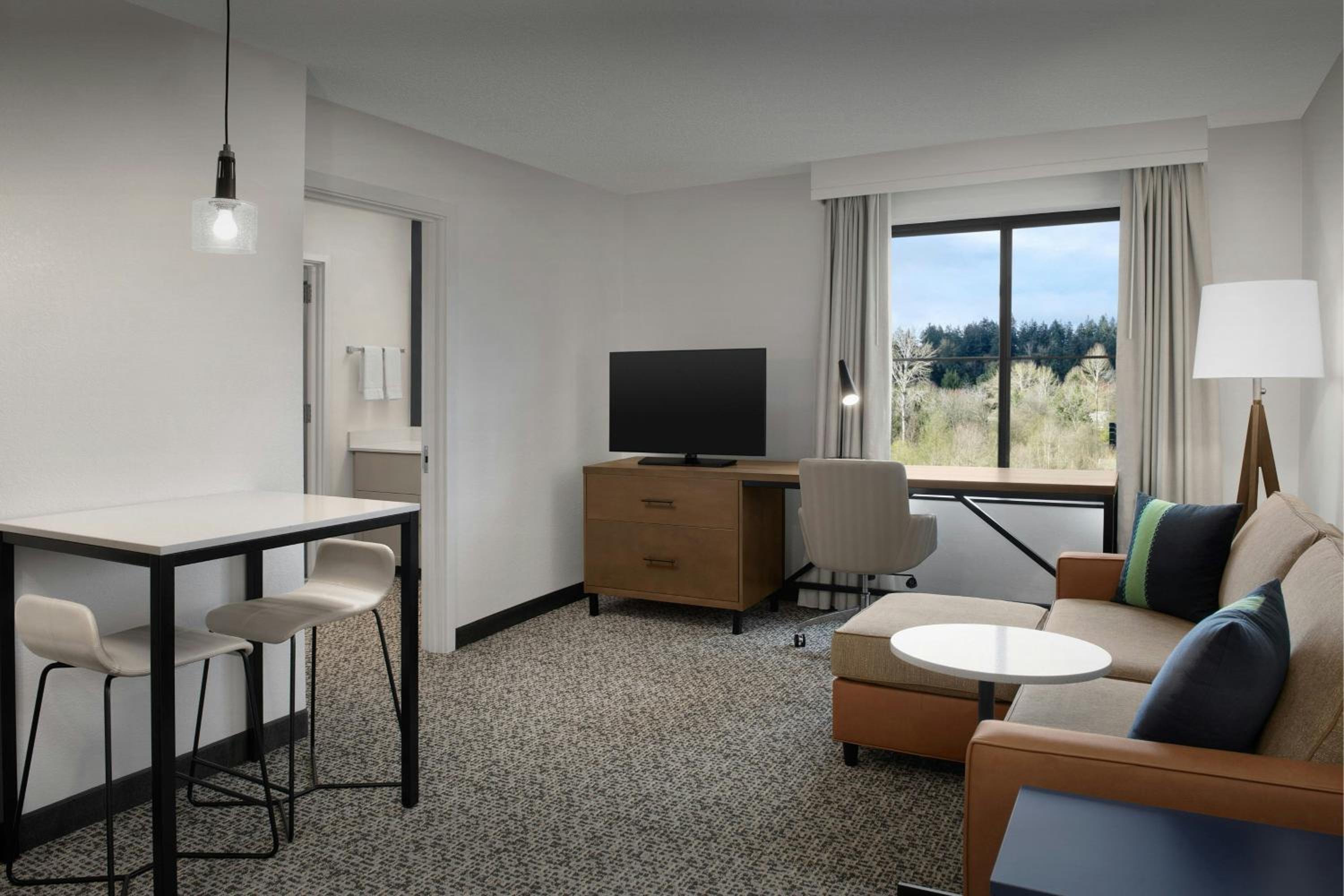One-Bedroom King Suite with View and Sofa Bed - Mobility/Hearing Accessible with Roll-In Shower photo 1