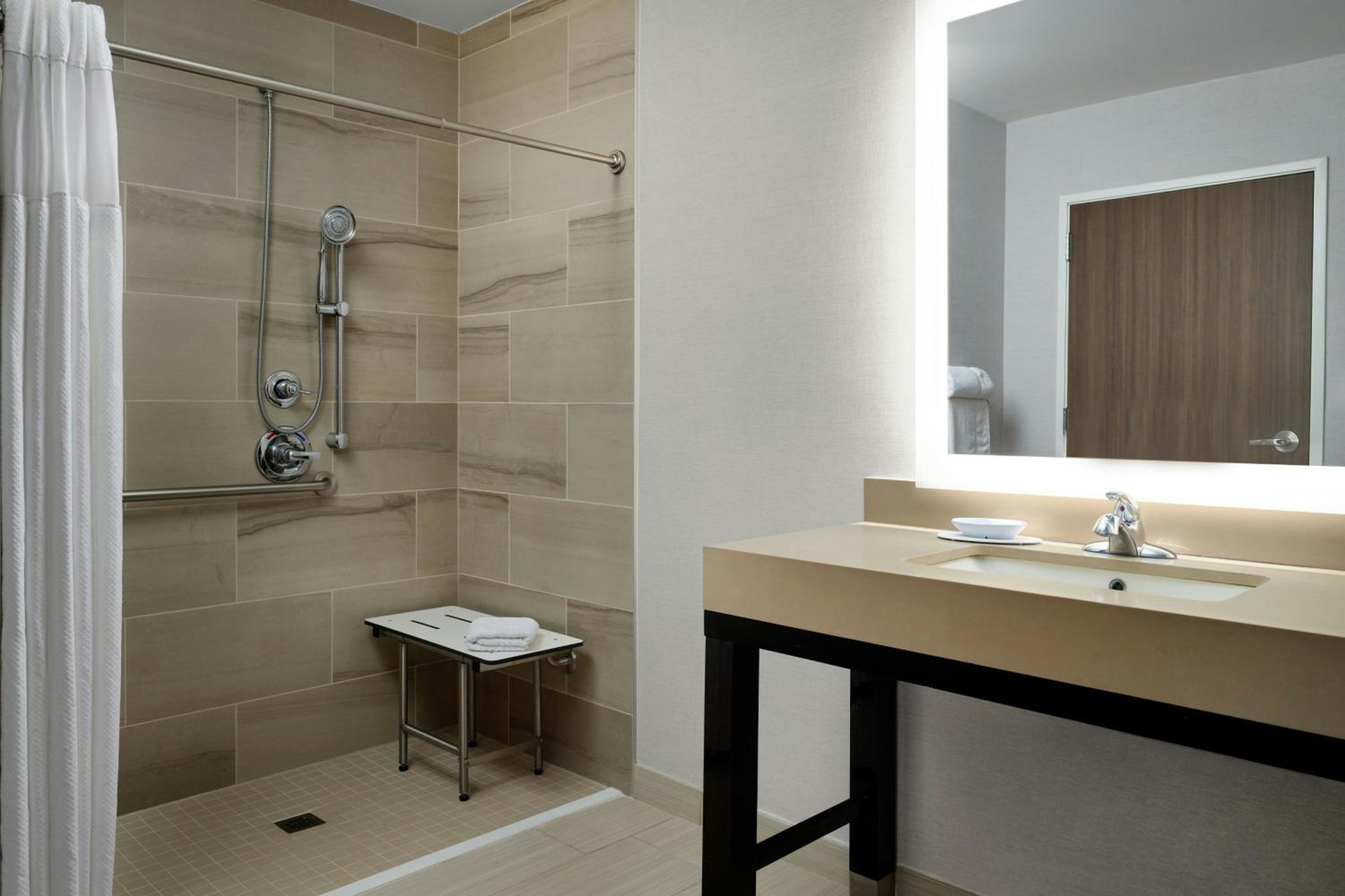 King Room with Sofa Bed and Roll-in Shower - Mobility and Hearing Accessible