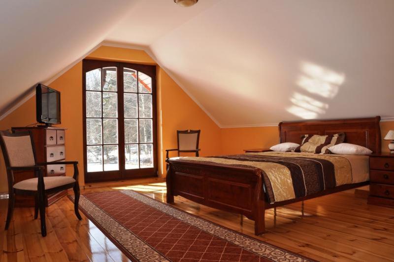Family Room with Balcony - Photo 13