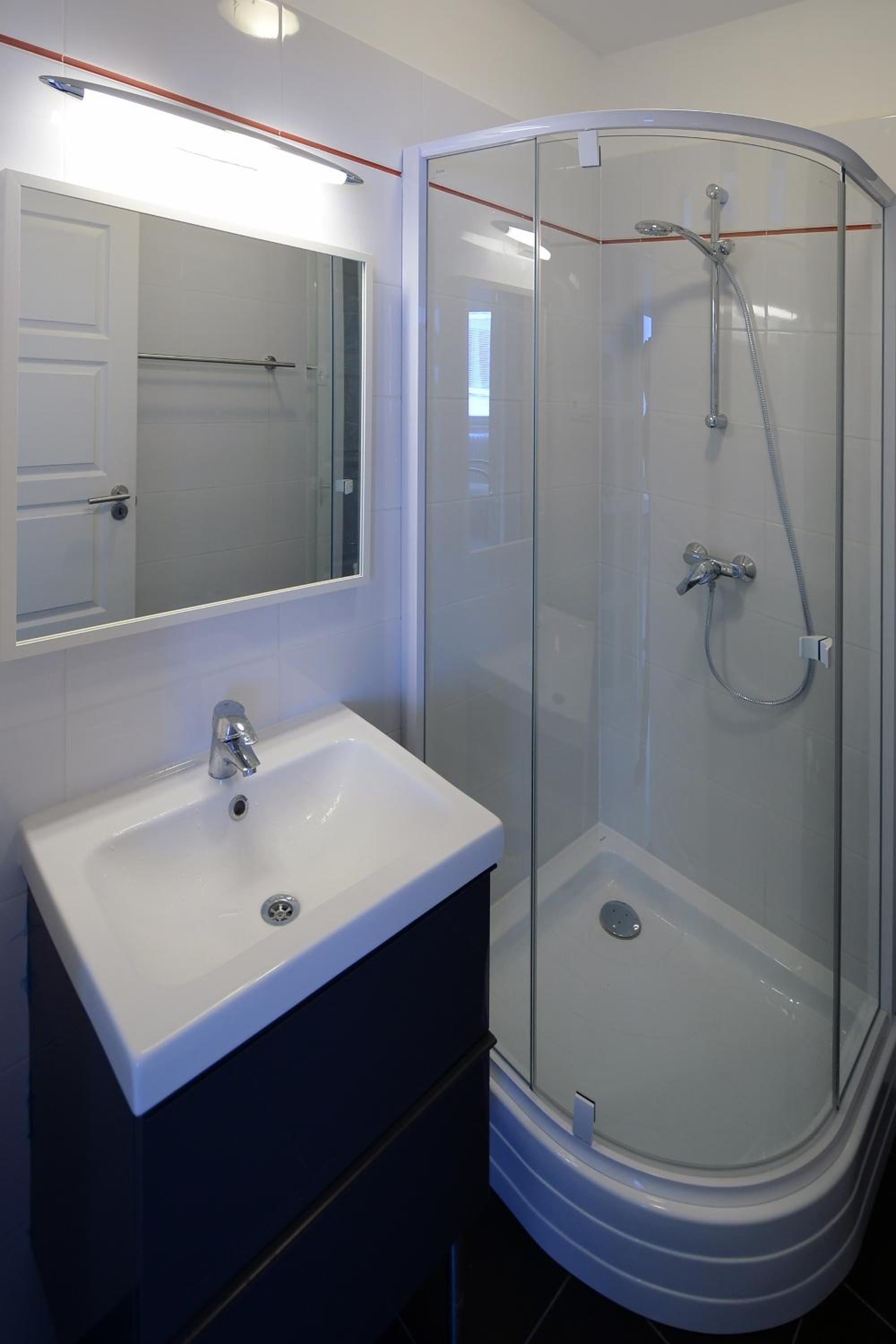 Three-Bedroom Apartment - Photo 11
