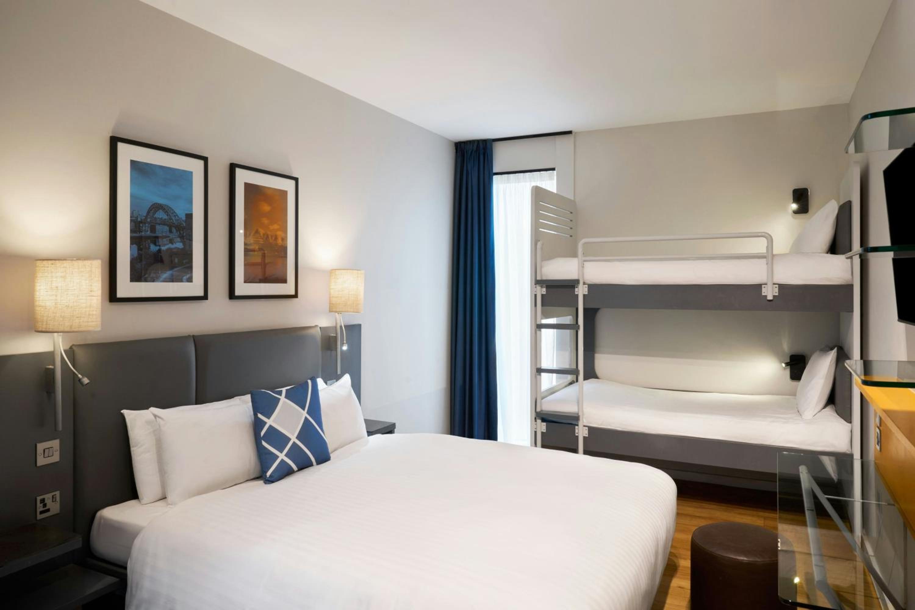 Family Room with One Double Bed and Two Bunk Beds - Photo 1