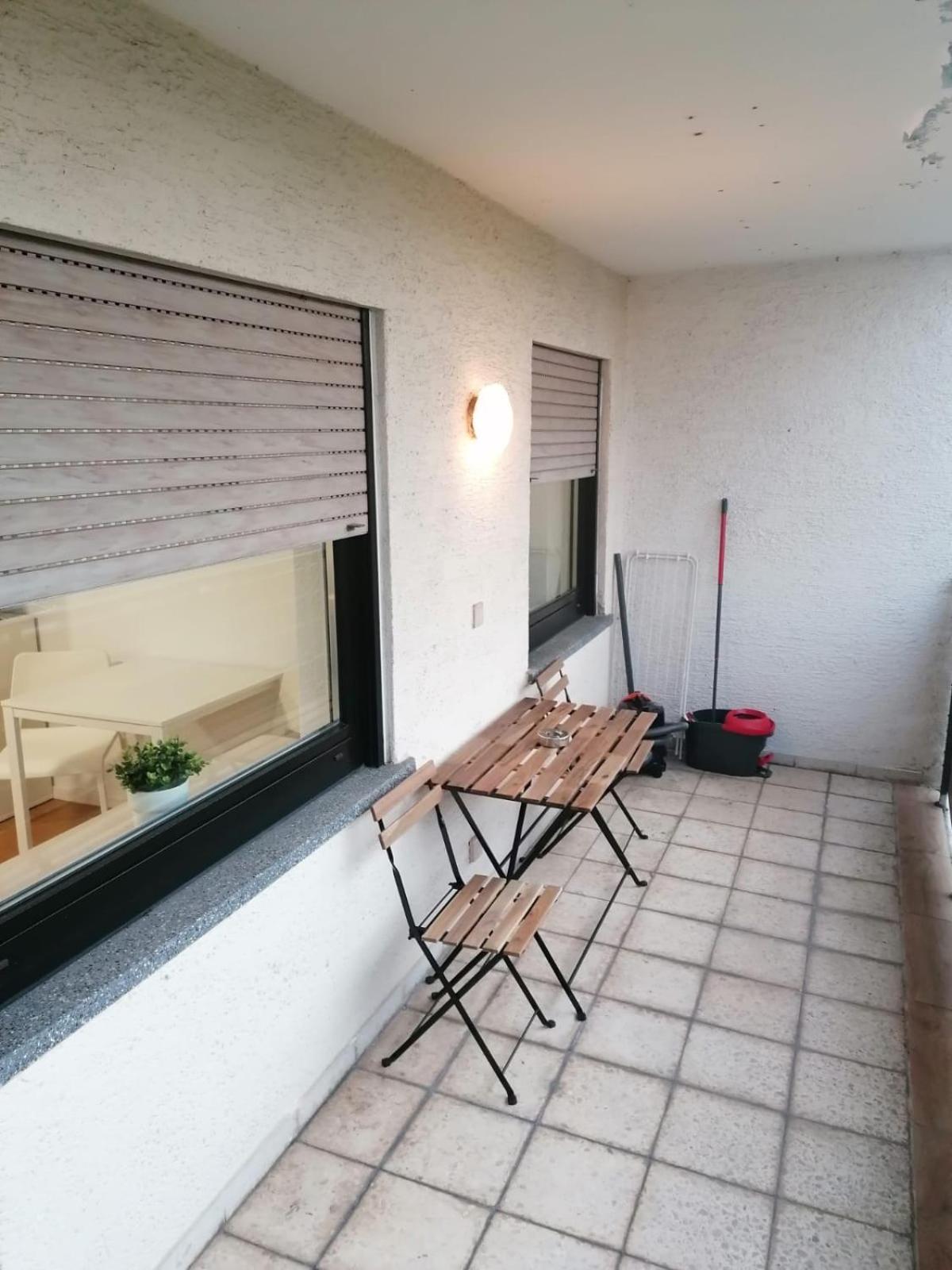 Two-Bedroom Apartment with Balcony