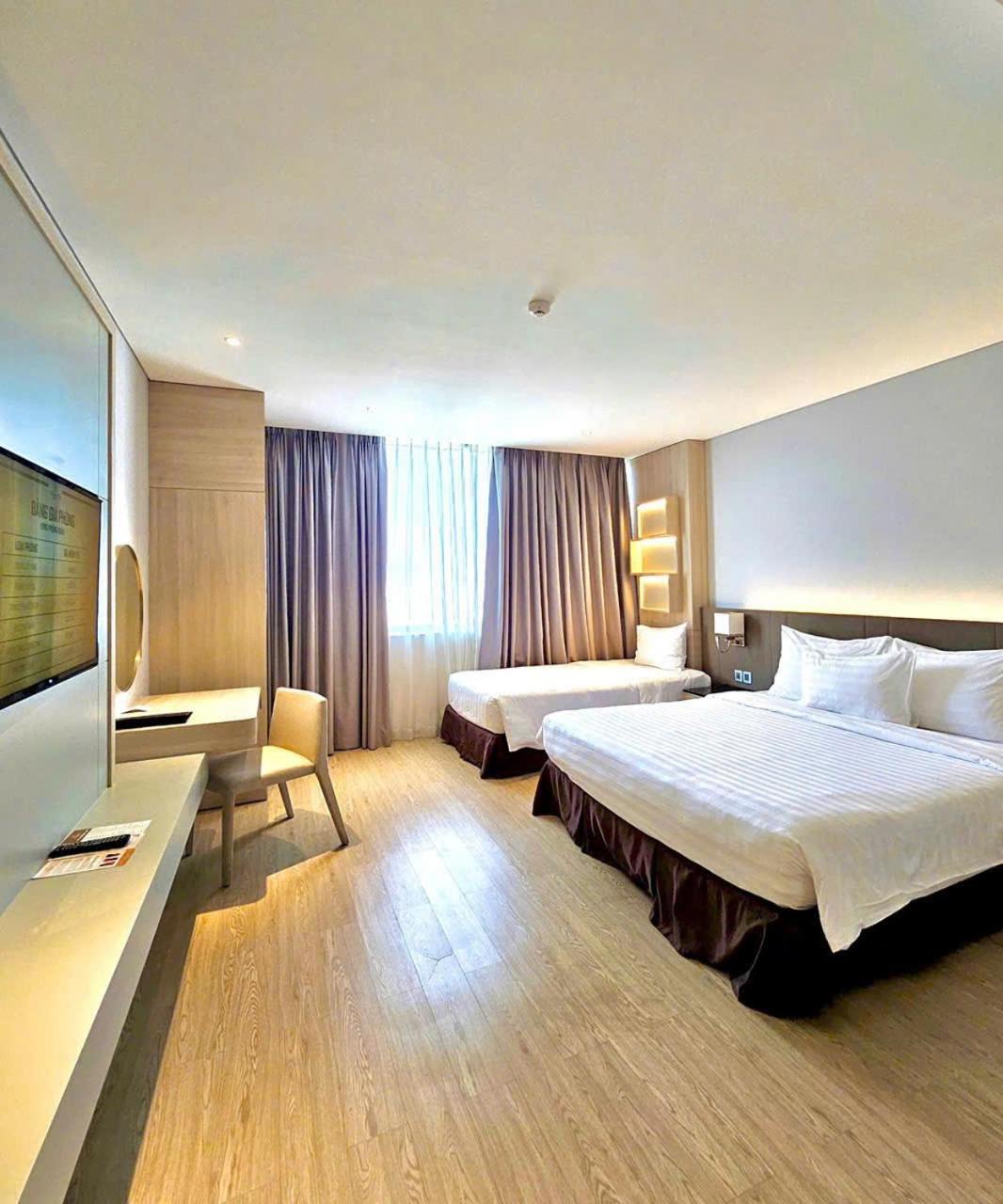 Deluxe Triple Room - Photo 1