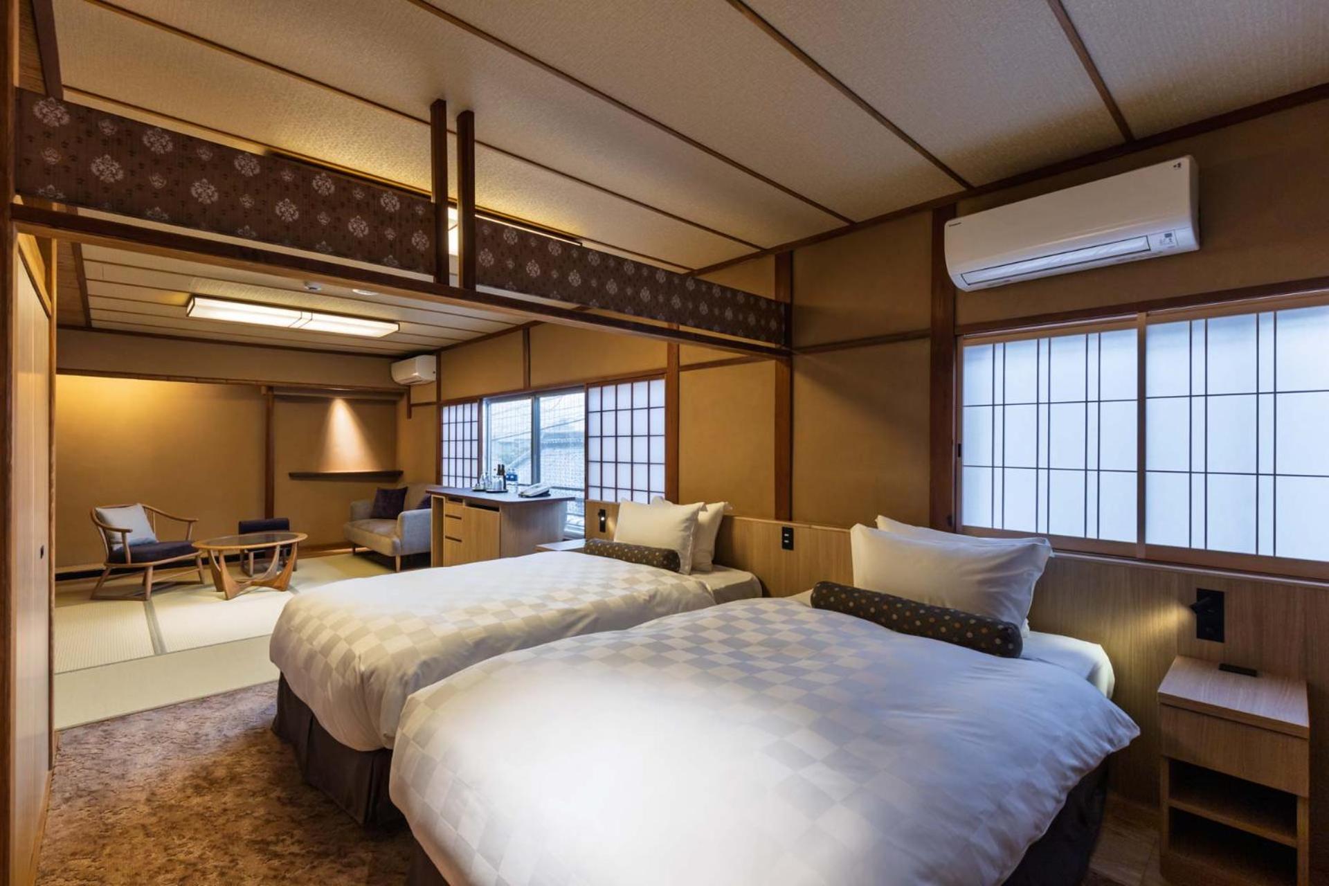 Deluxe Quadruple Room - Photo 1