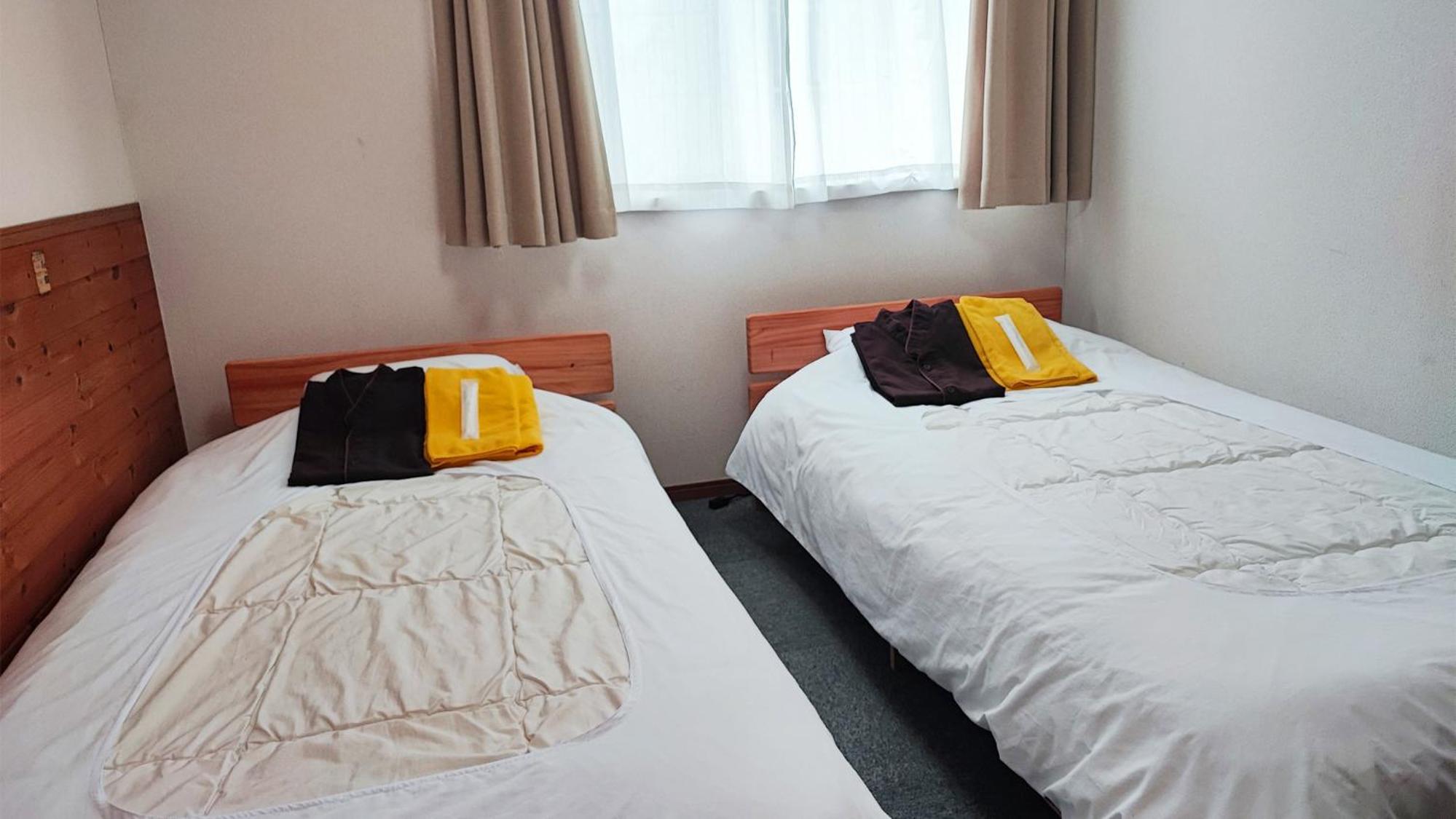 Standard Twin Room - Photo 5