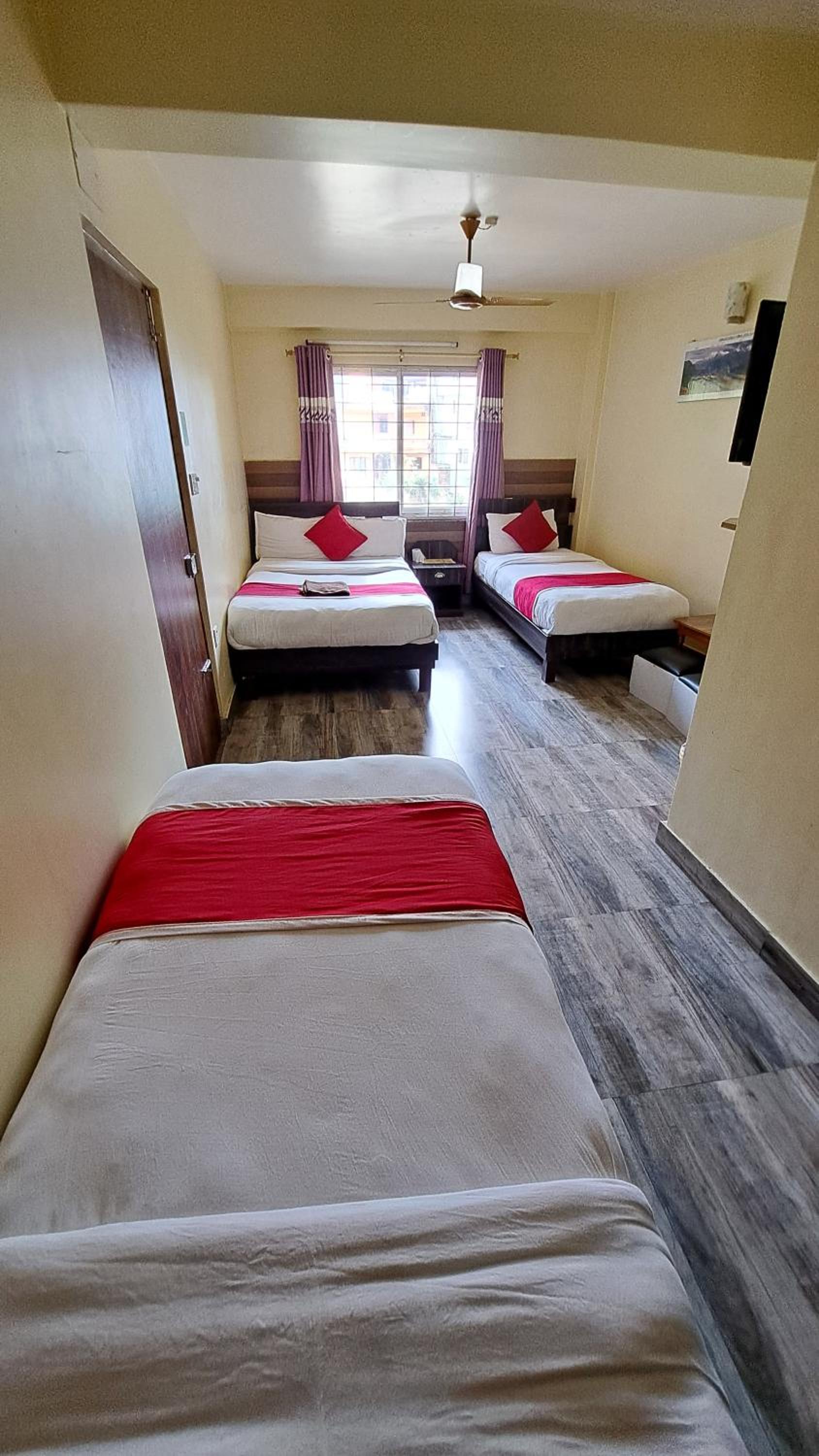 Quadruple Room with Private Bathroom