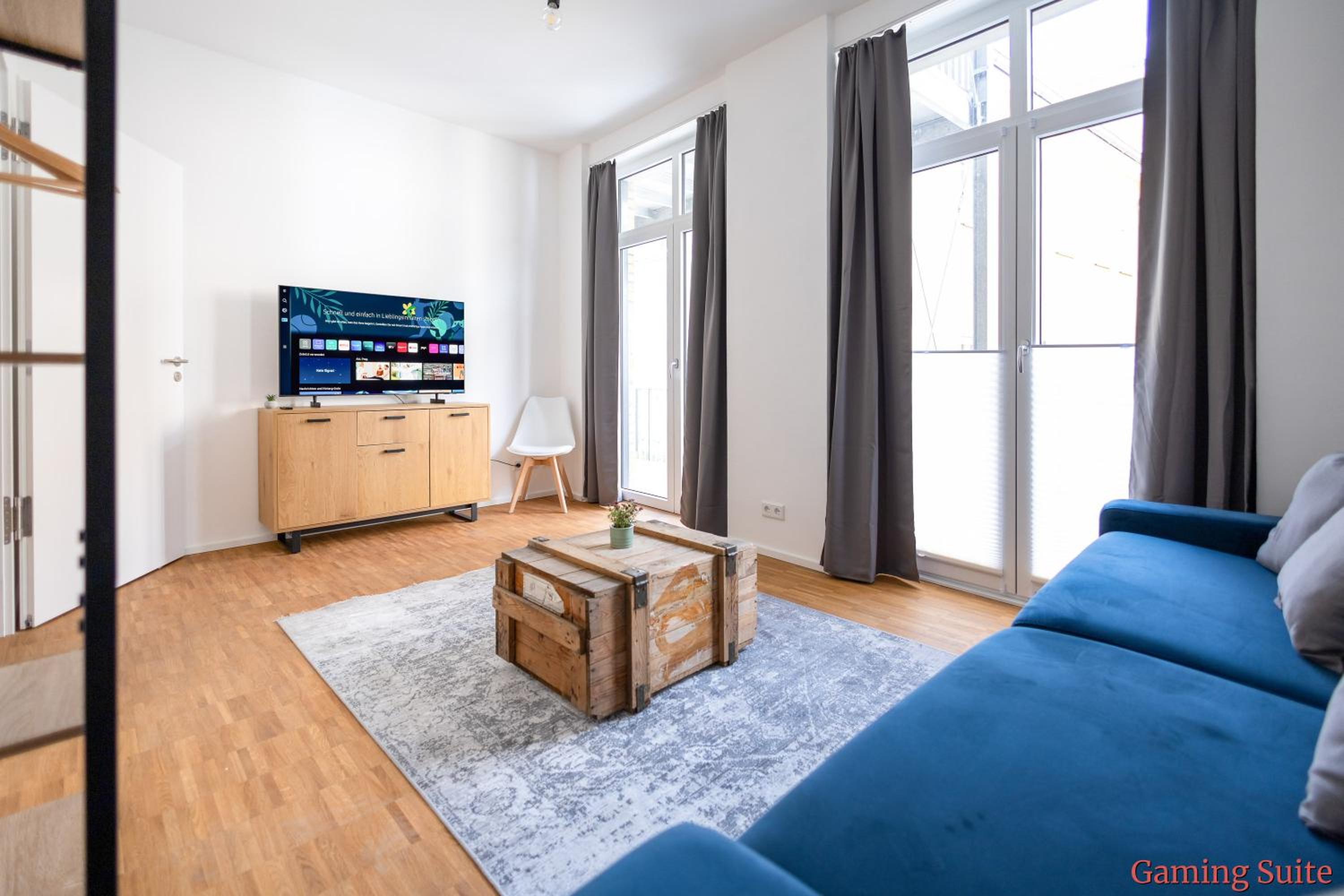 Two-Bedroom Apartment with Balcony (Gaming Suite) photo 2