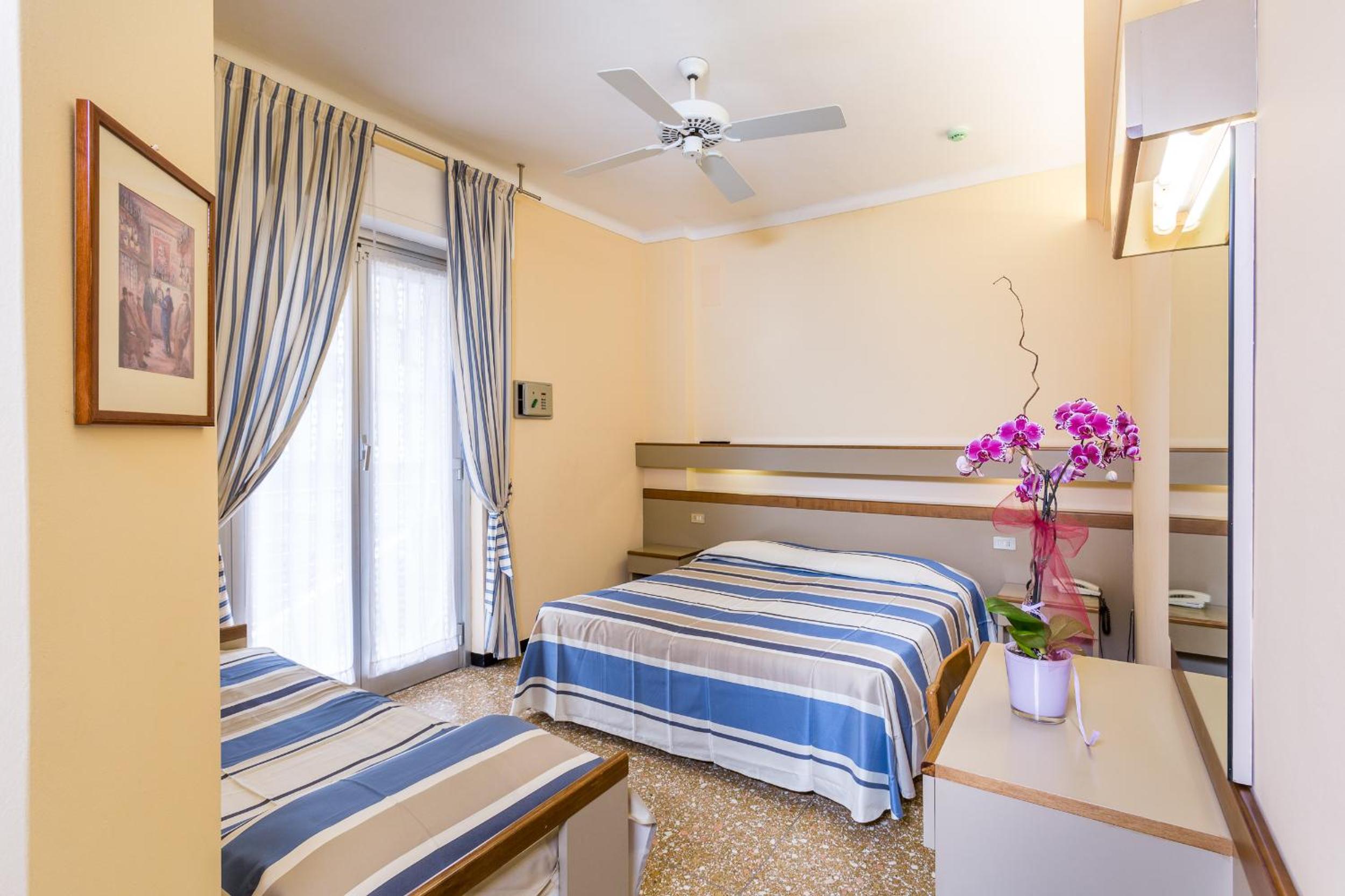 Triple Room with Balcony and Garden View photo 1