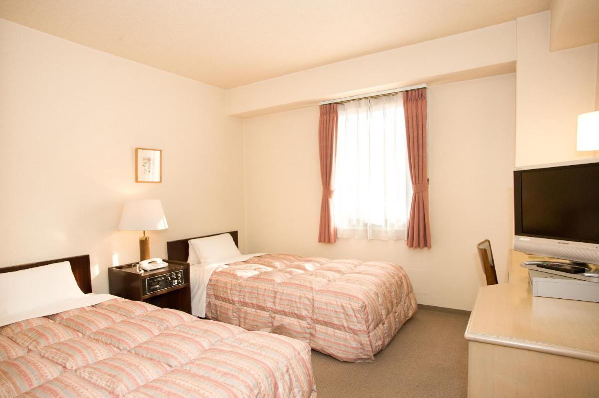 Twin Room - Non-Smoking photo 2