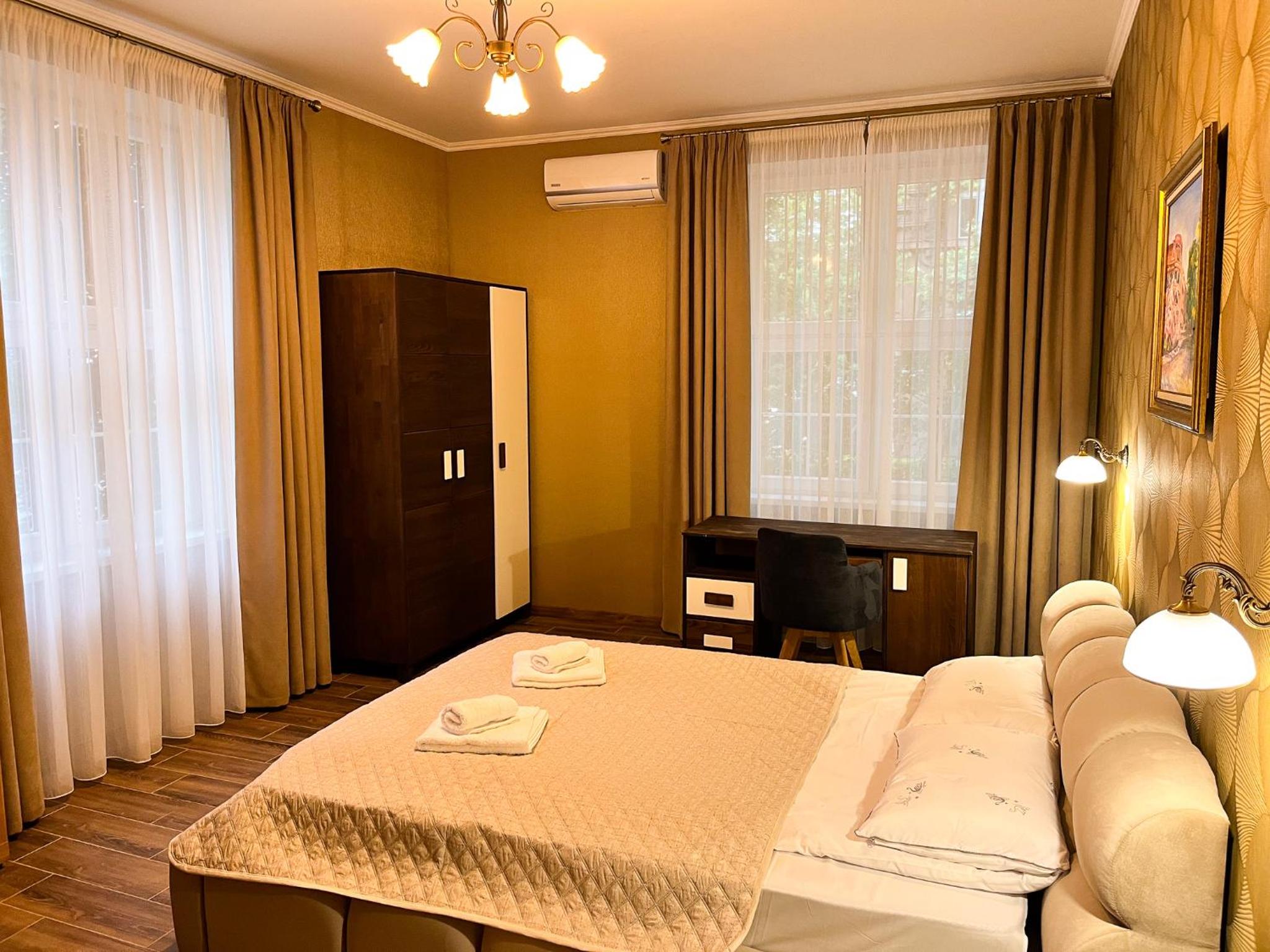 One-Bedroom Apartment with Balcony and City View